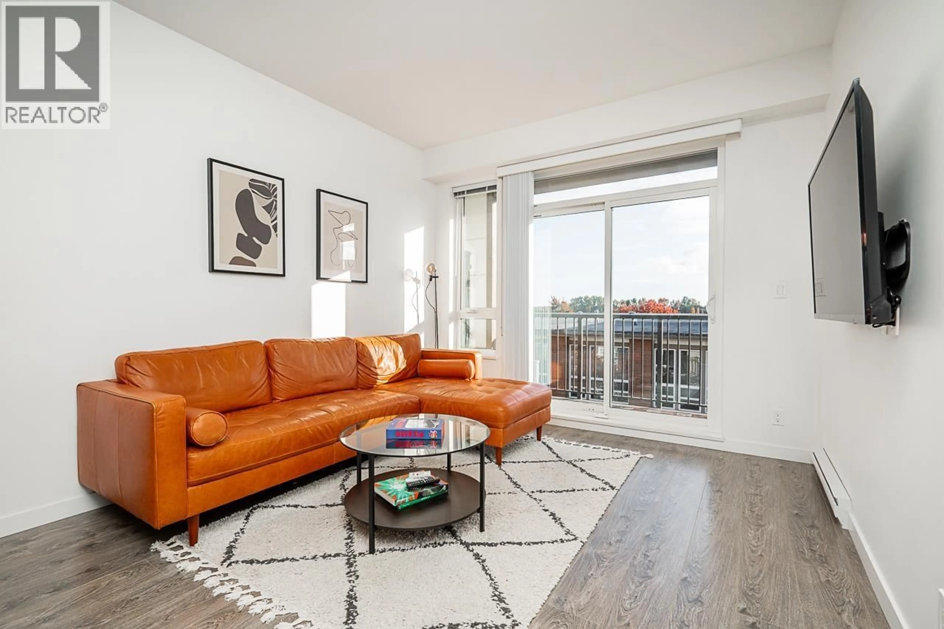 Living room with furniture, wood/laminate floor for 416 - 12339 STEVESTON HIGHWAY, Richmond British Columbia V6W0B4