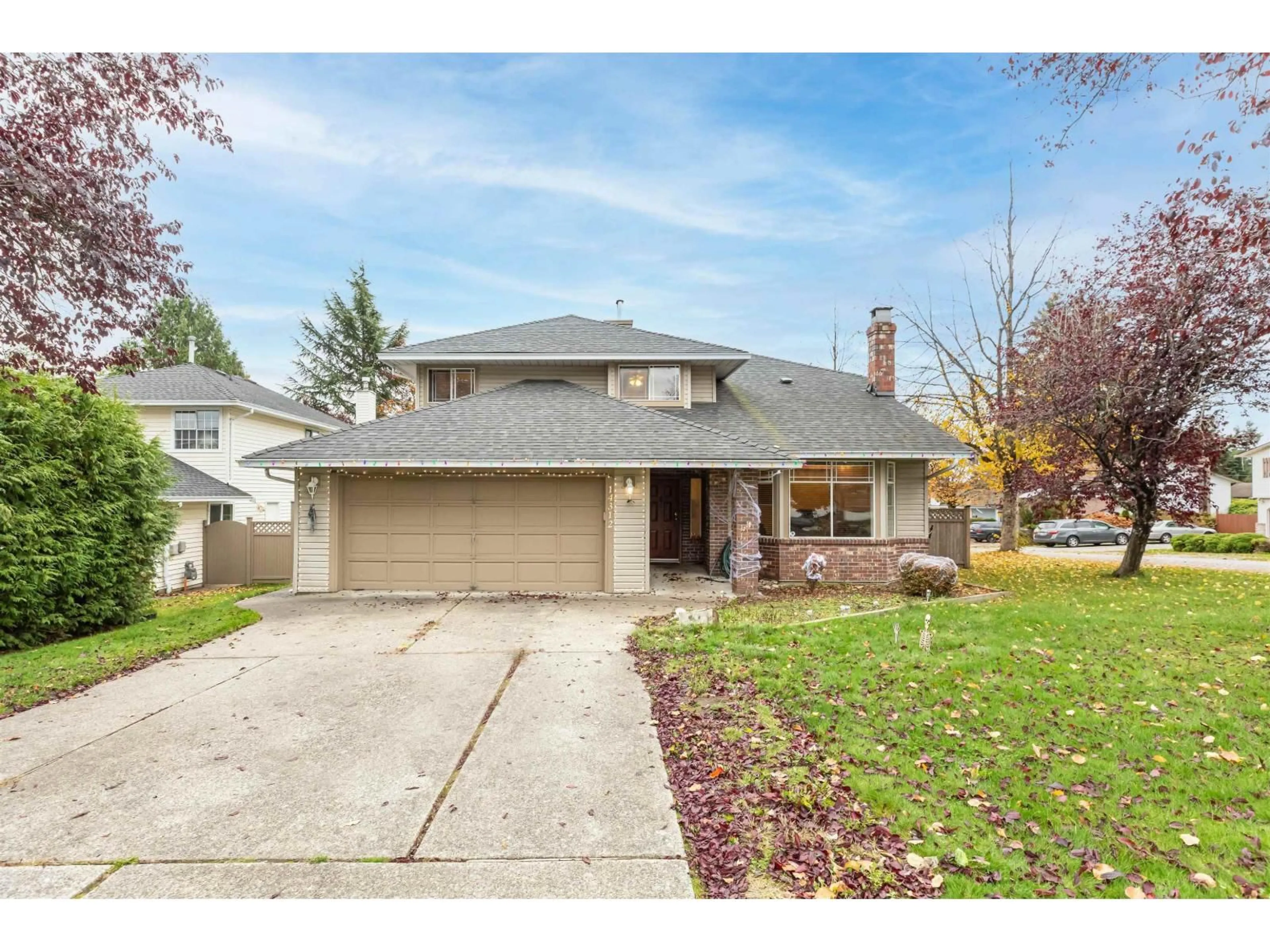 Home with vinyl exterior material, street for 14312 69A STREET, Surrey British Columbia V3W0E2