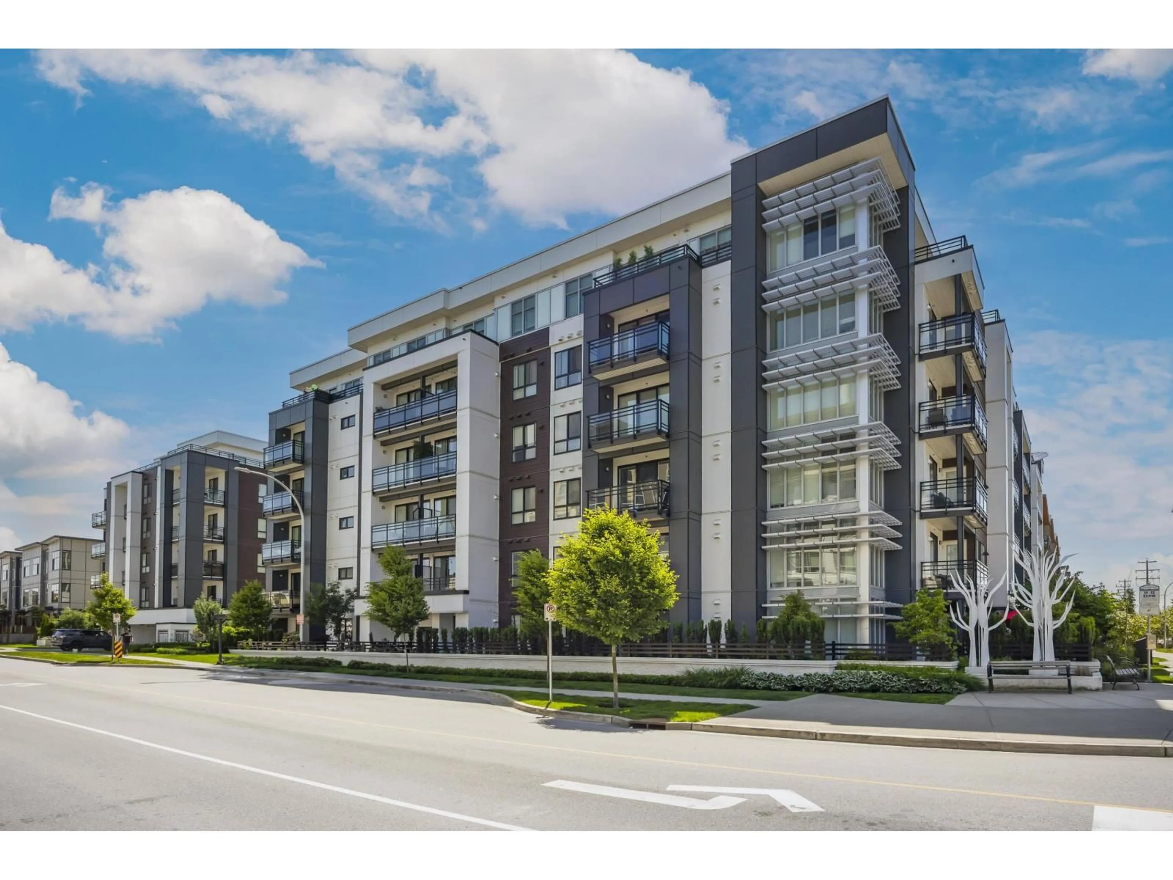 A pic from outside/outdoor area/front of a property/back of a property/a pic from drone, street for B408 - 20838 78B AVENUE, Langley British Columbia V2Y3M2