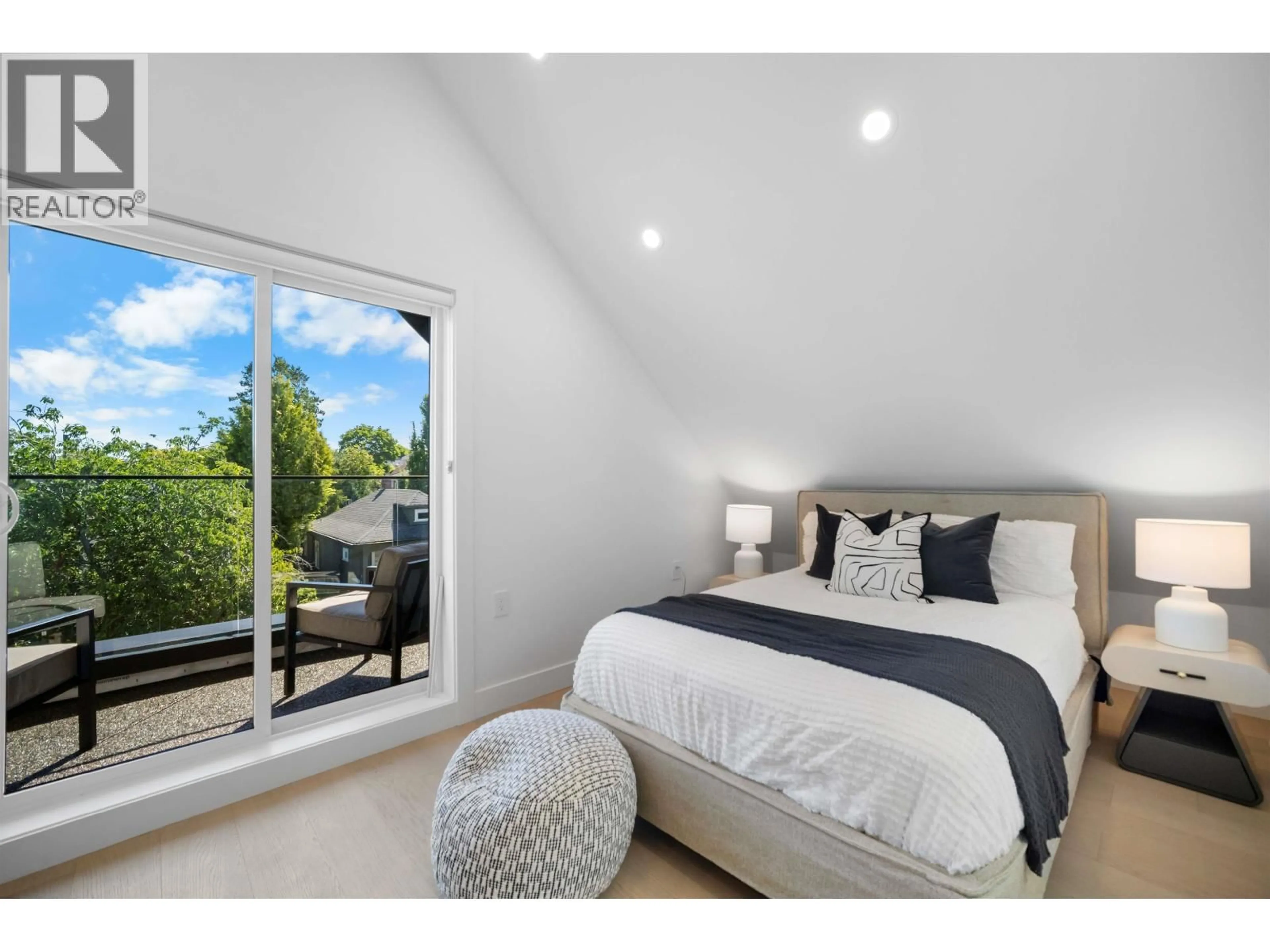 Bedroom with bed, wood/laminate floor for 1 - 5033 PRINCE ALBERT STREET, Vancouver British Columbia V5W3C5