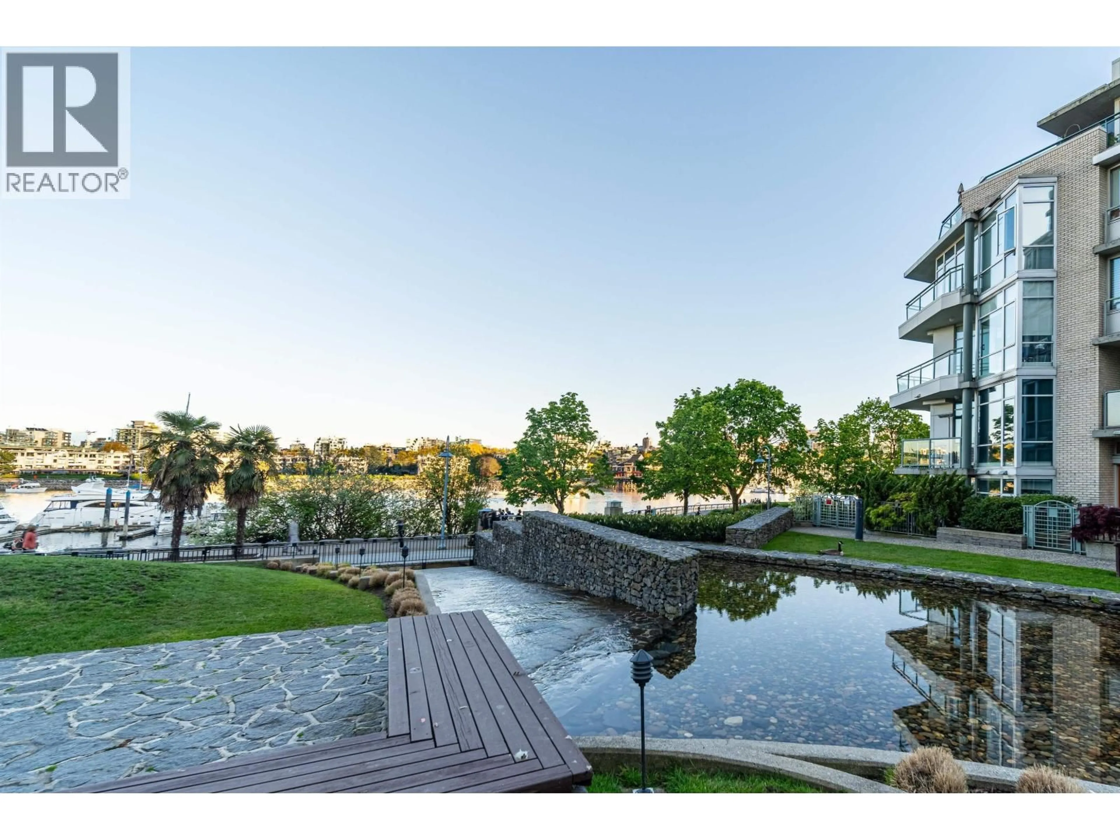 A pic from outside/outdoor area/front of a property/back of a property/a pic from drone, water/lake/river/ocean view for 906 - 1288 MARINASIDE CRESCENT, Vancouver British Columbia V6Z2W5