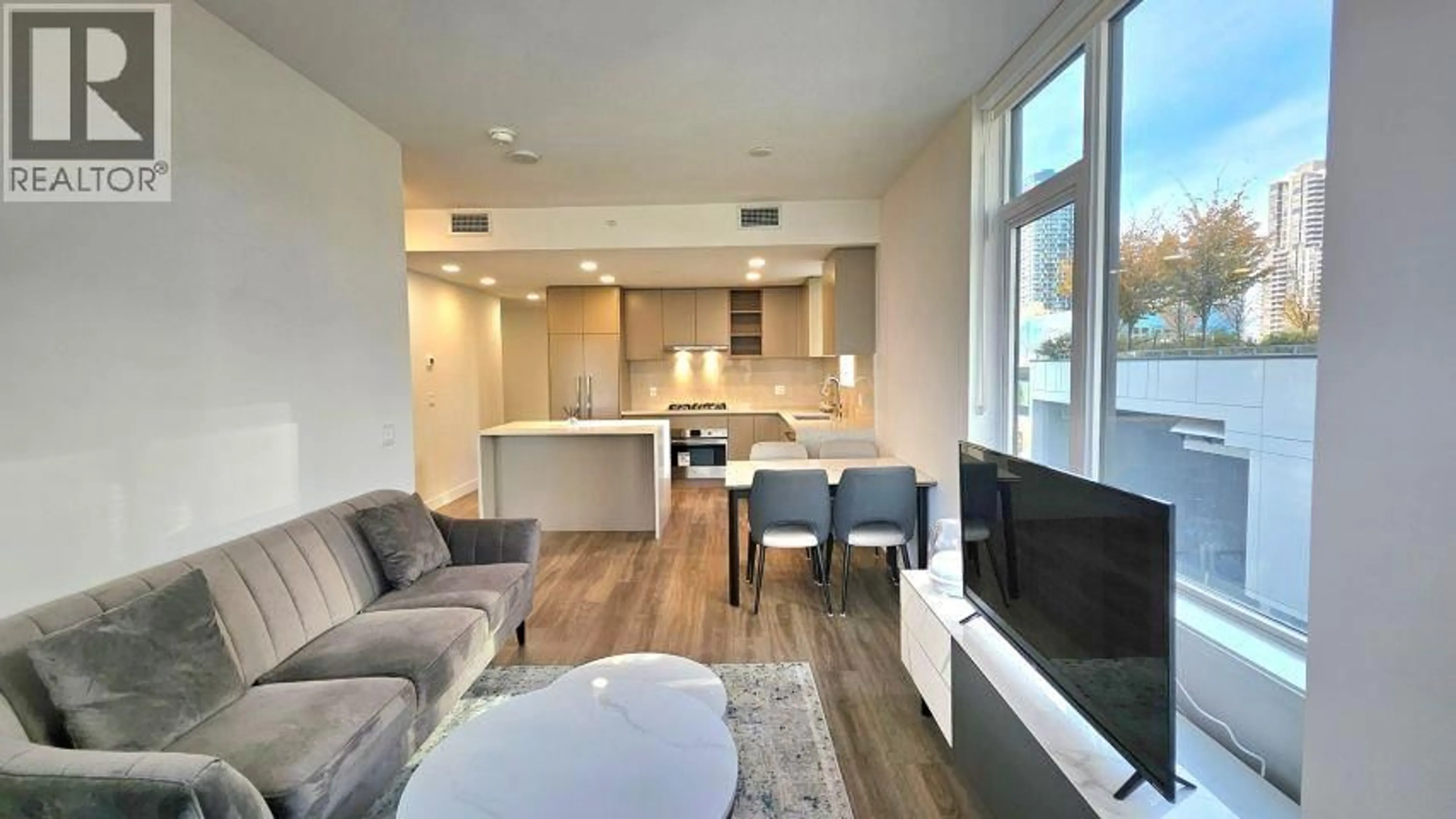 Living room with furniture, unknown for 301 - 4433 ALASKA STREET, Burnaby British Columbia V5C0N3