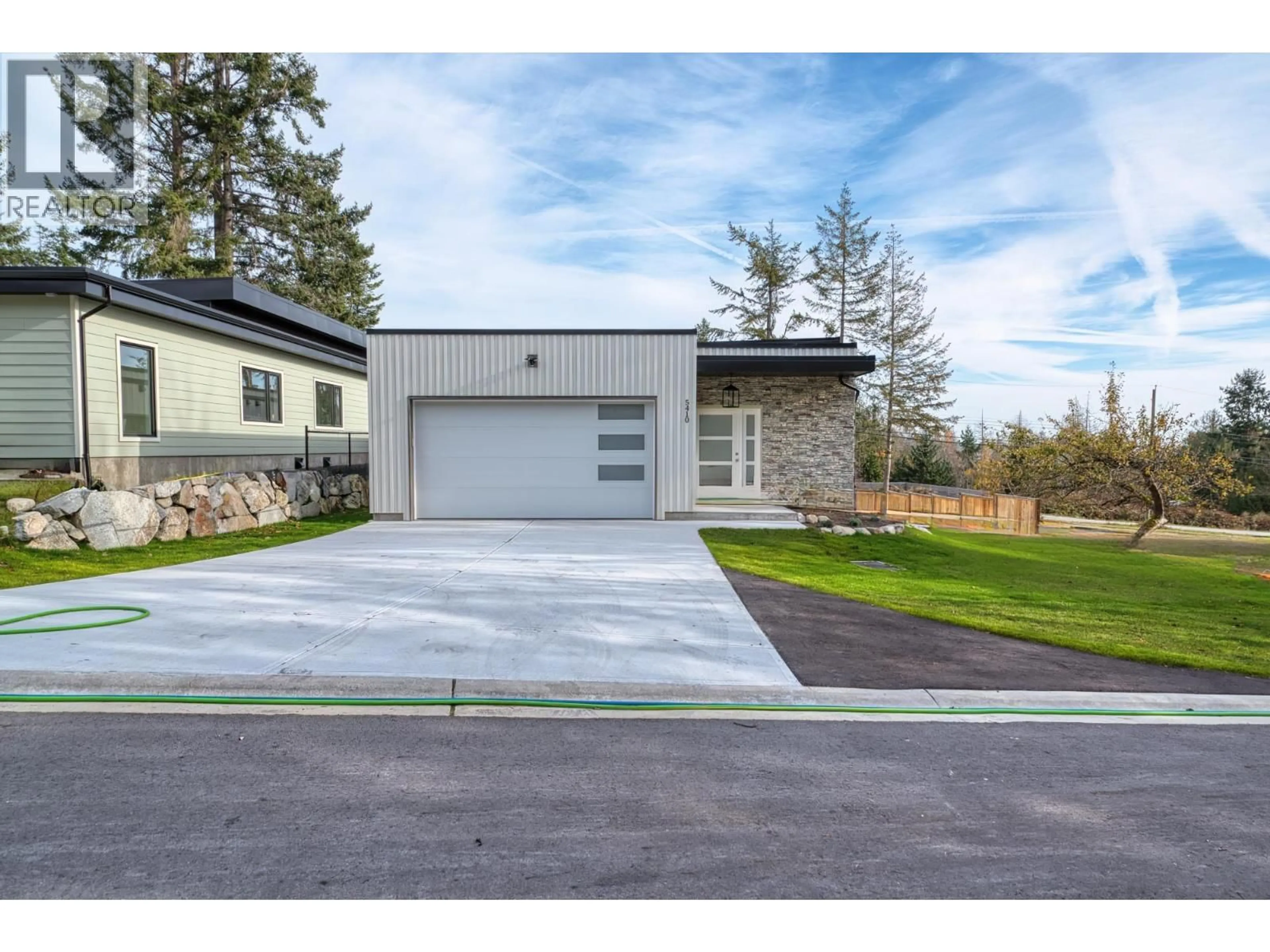 Home with vinyl exterior material, street for 5410 STELLAR WAY, Sechelt British Columbia V7Z0M3