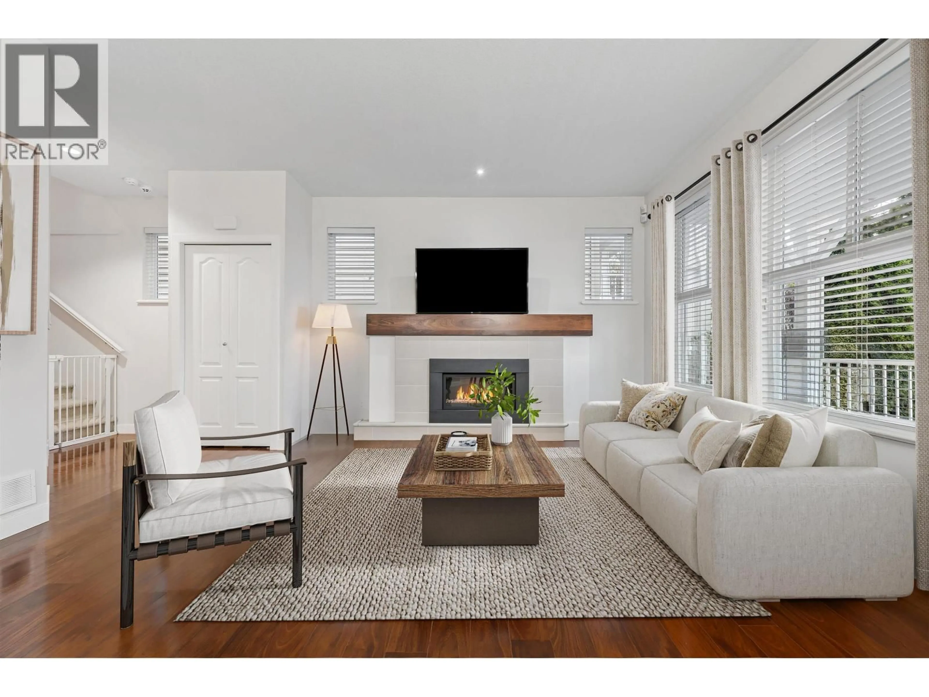 Living room with furniture, wood/laminate floor for 2 - 312 CASEY STREET, Coquitlam British Columbia V3K0C6