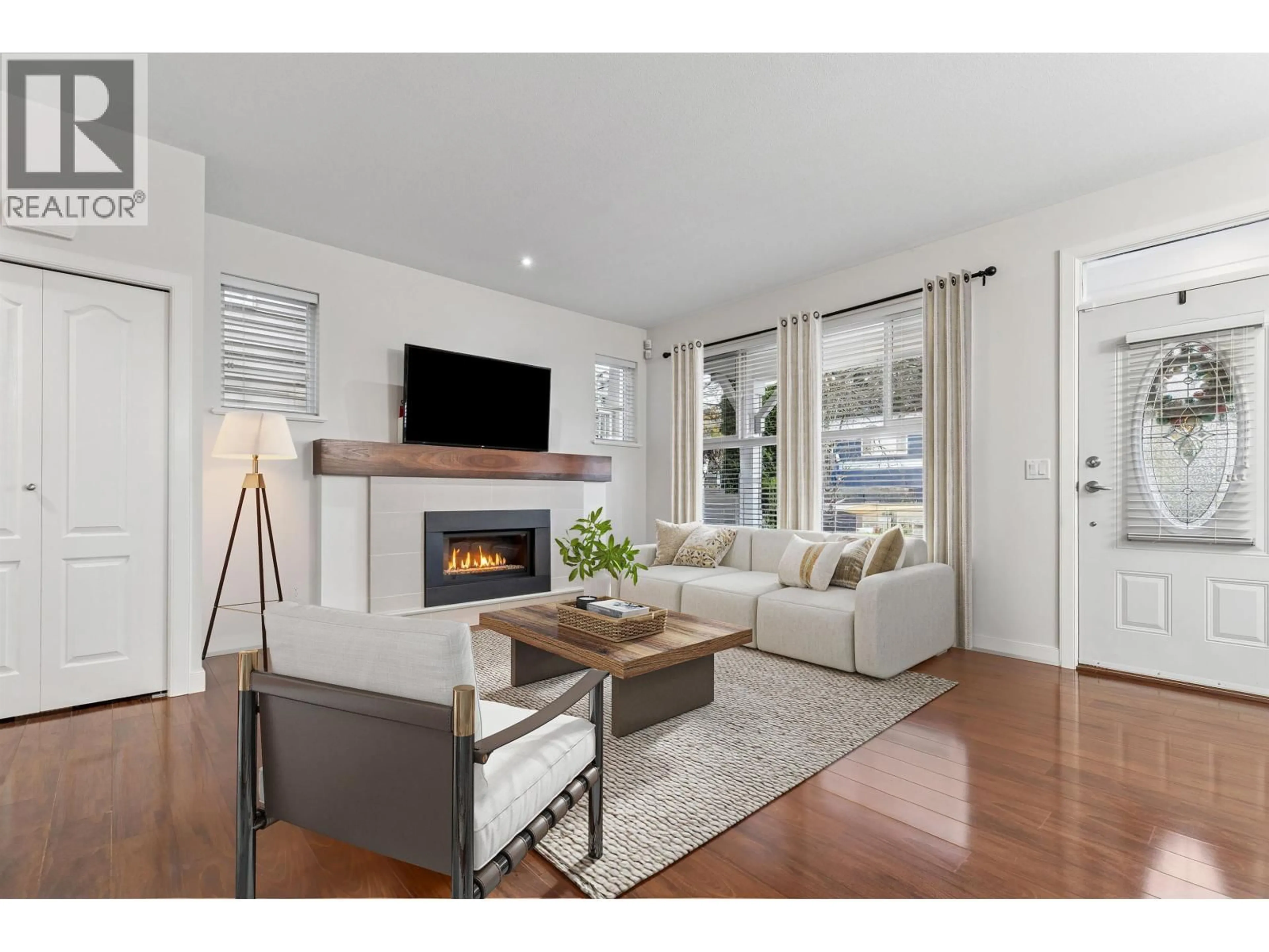 Living room with furniture, wood/laminate floor for 2 - 312 CASEY STREET, Coquitlam British Columbia V3K0C6