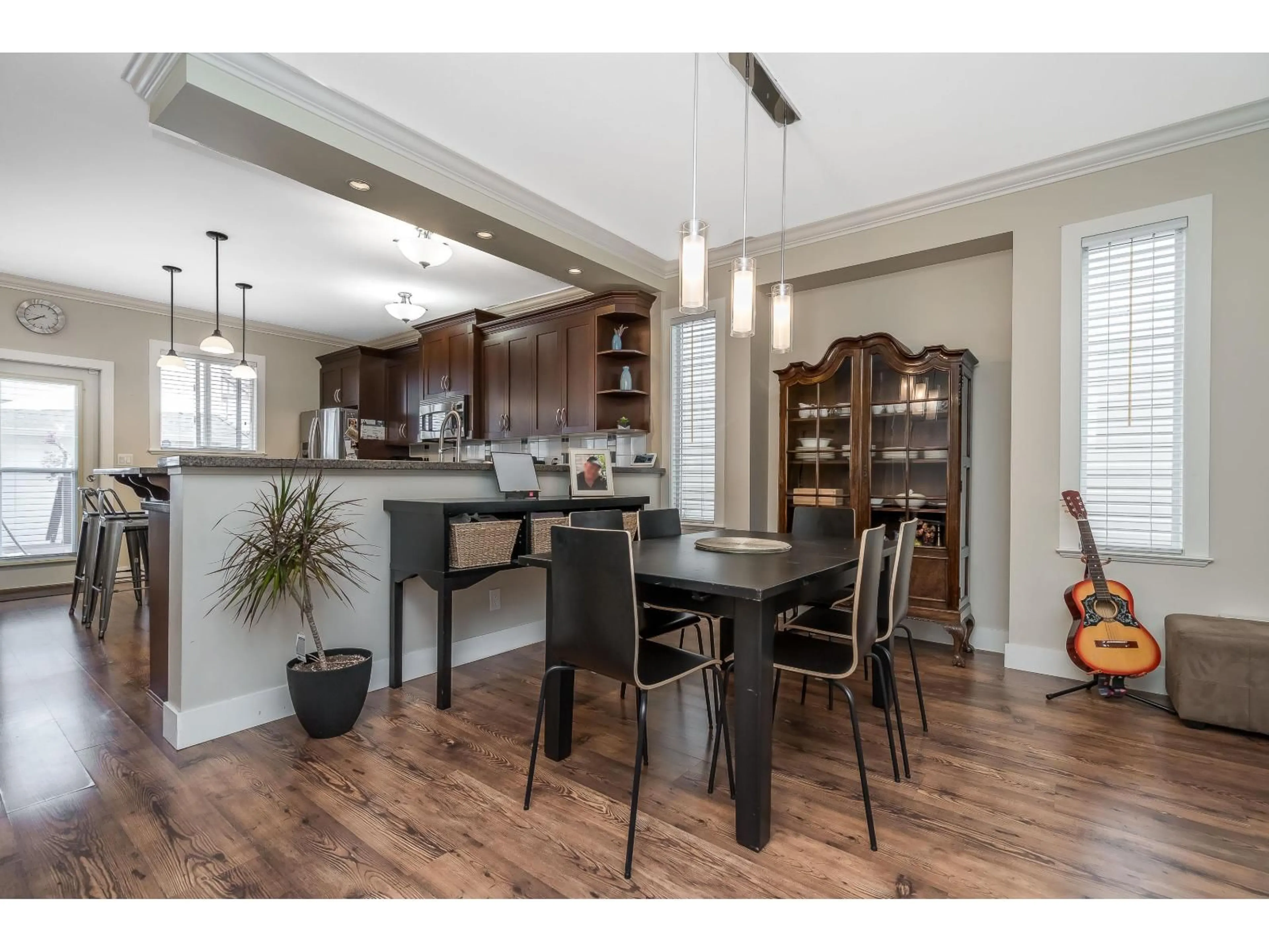Open concept kitchen, wood/laminate floor for 19232 68A AVENUE, Surrey British Columbia V4N0B6