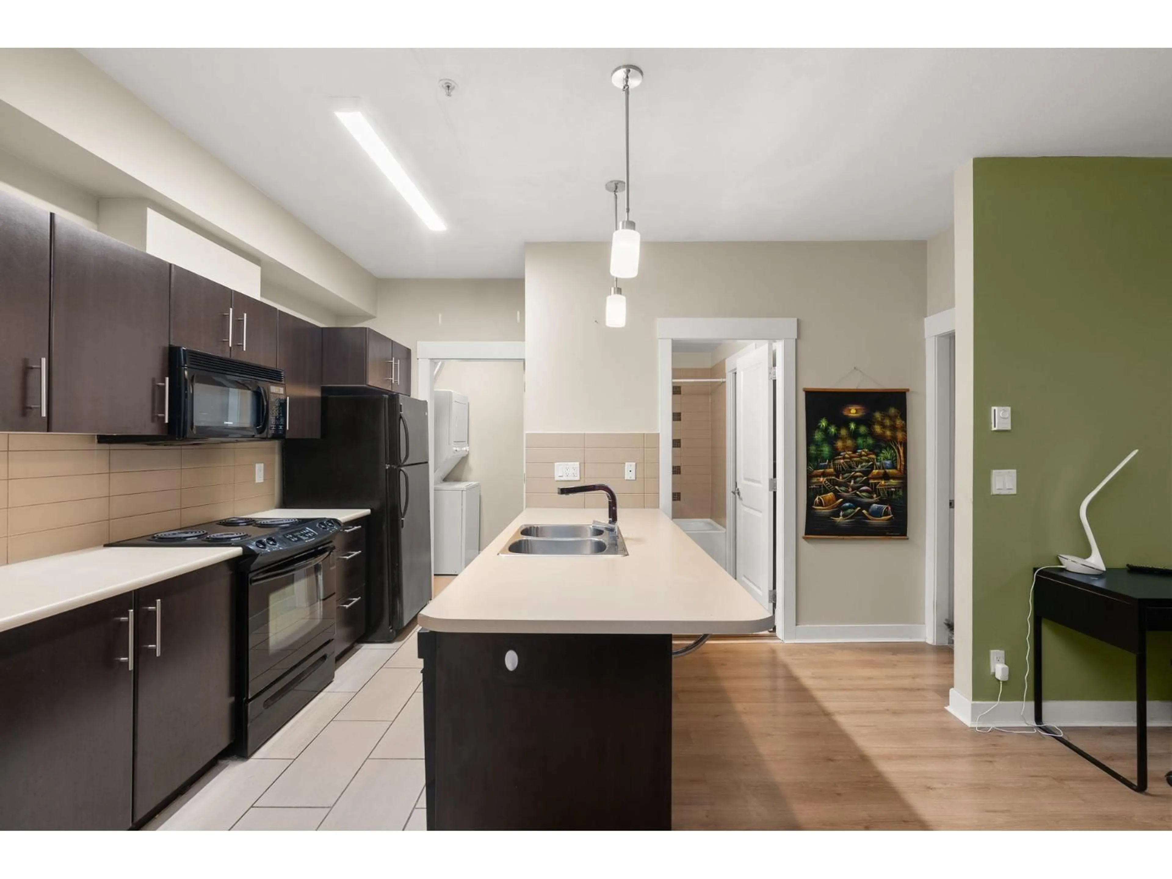 Open concept kitchen, unknown for 103 - 33545 RAINBOW AVENUE, Abbotsford British Columbia V2S0B9