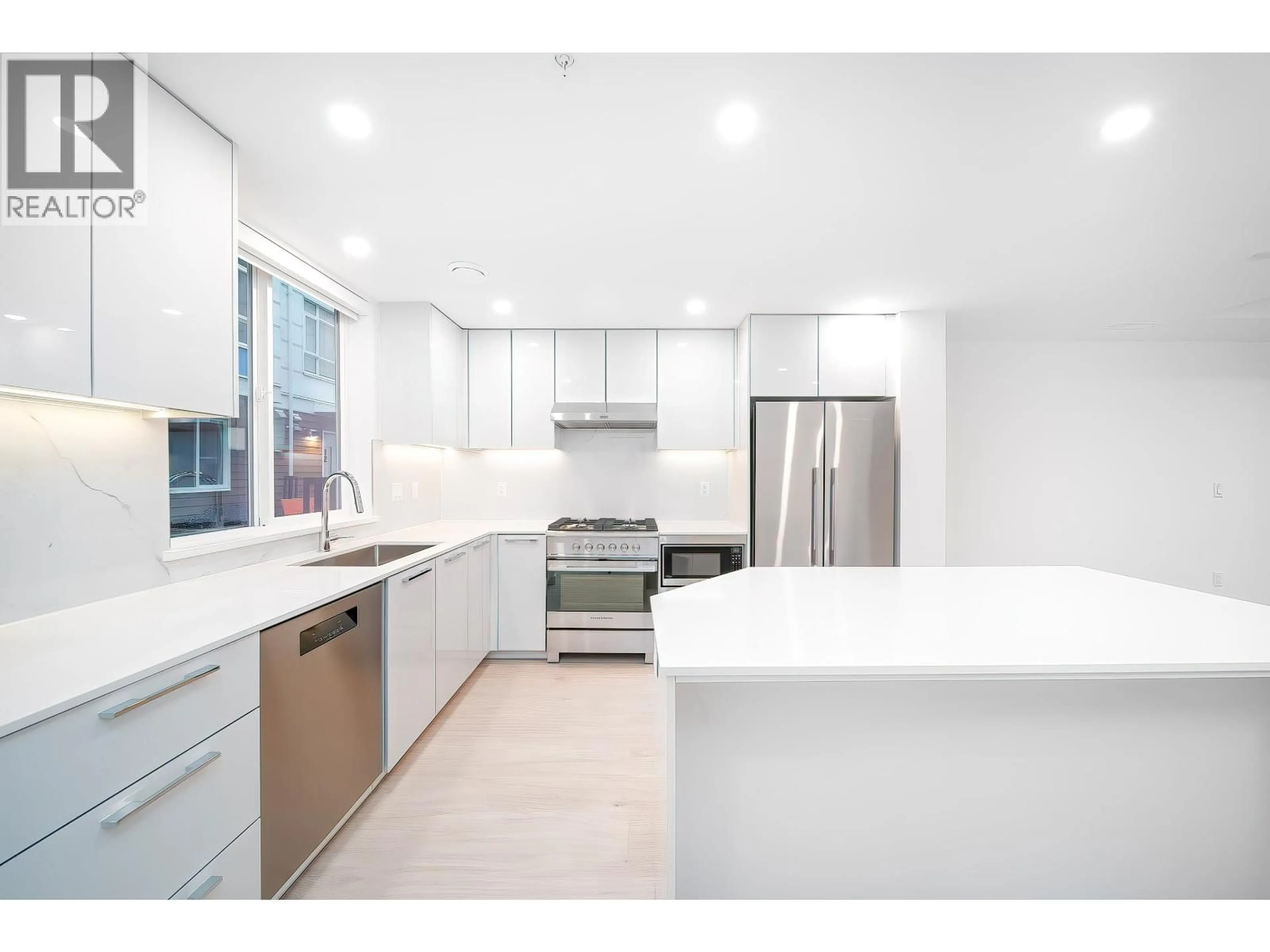 Open concept kitchen, ceramic/tile floor for SL6 - 10333 RIVER DRIVE, Richmond British Columbia V6X1Z2