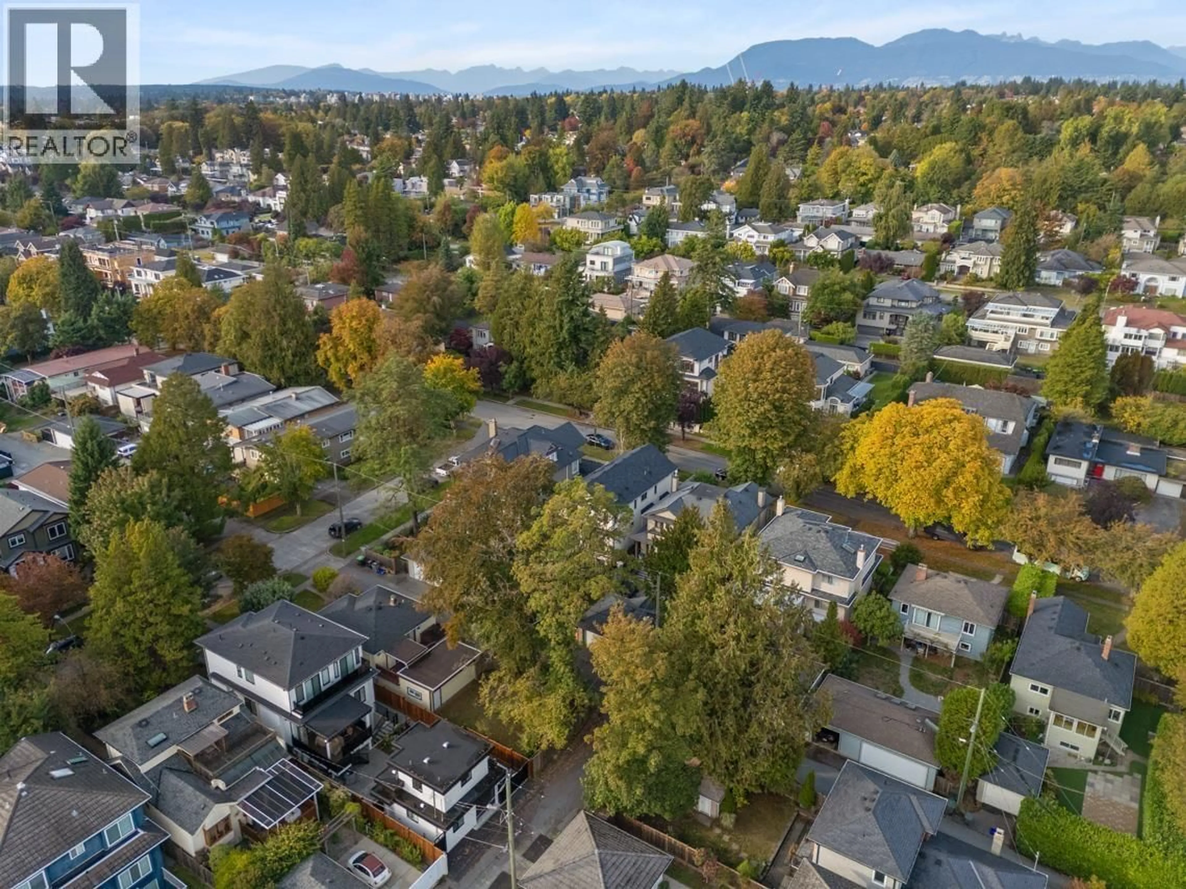 A pic from outside/outdoor area/front of a property/back of a property/a pic from drone, mountain view for 7526 SELKIRK STREET, Vancouver British Columbia V6P4H4