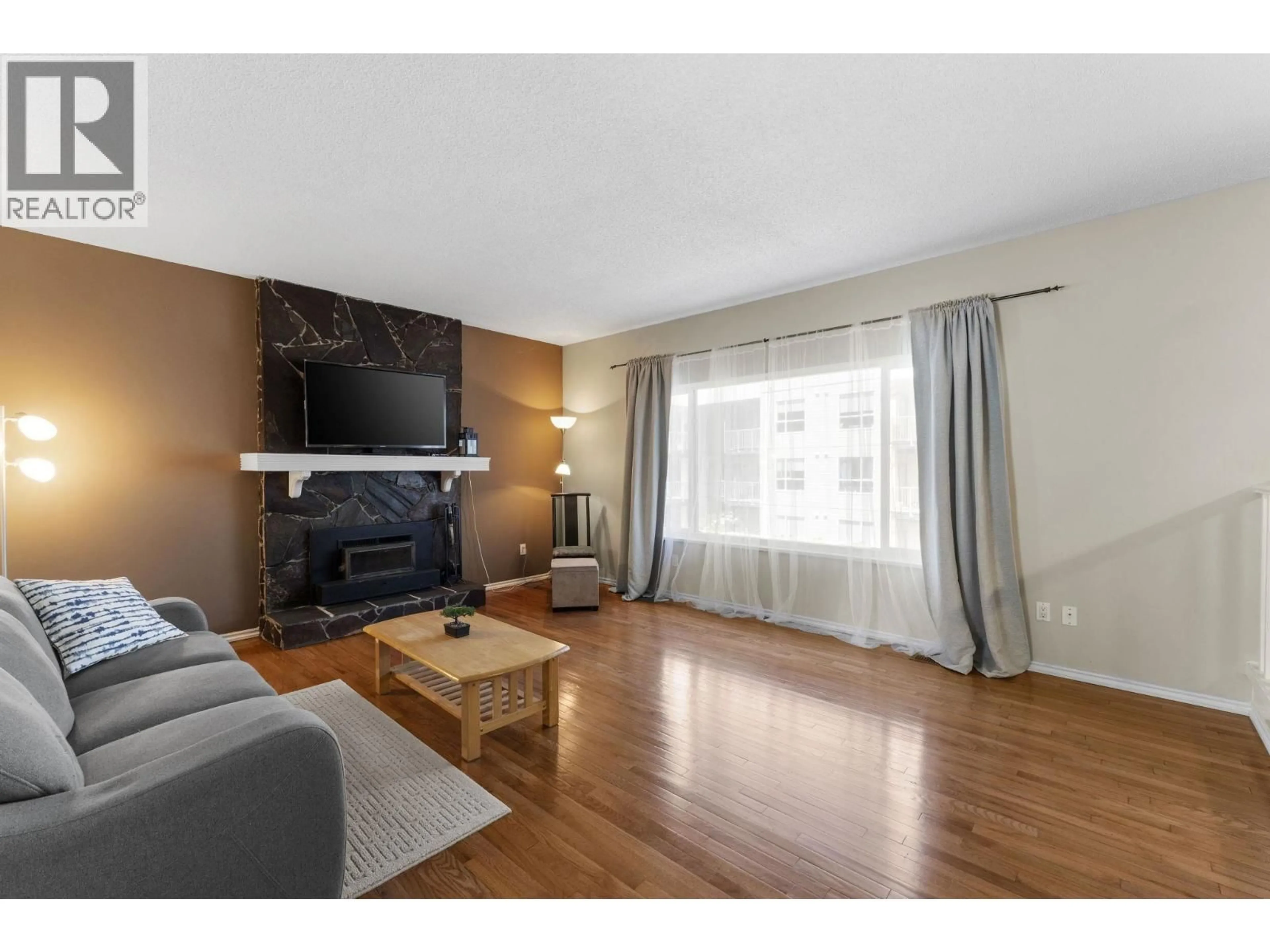 Living room with furniture, wood/laminate floor for 171 EDWARD CRESCENT, Port Moody British Columbia V3H3J8