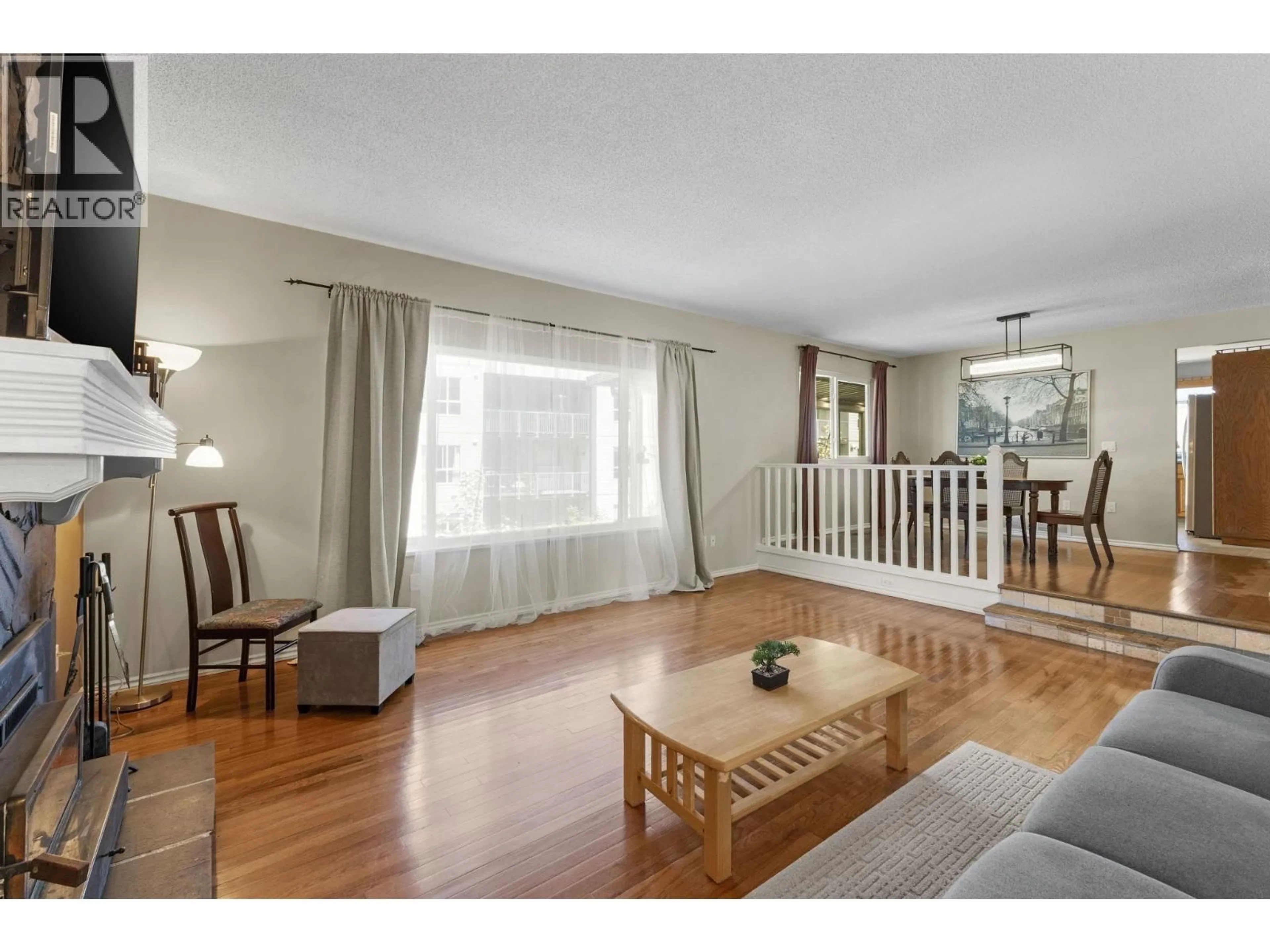 Living room with furniture, wood/laminate floor for 171 EDWARD CRESCENT, Port Moody British Columbia V3H3J8