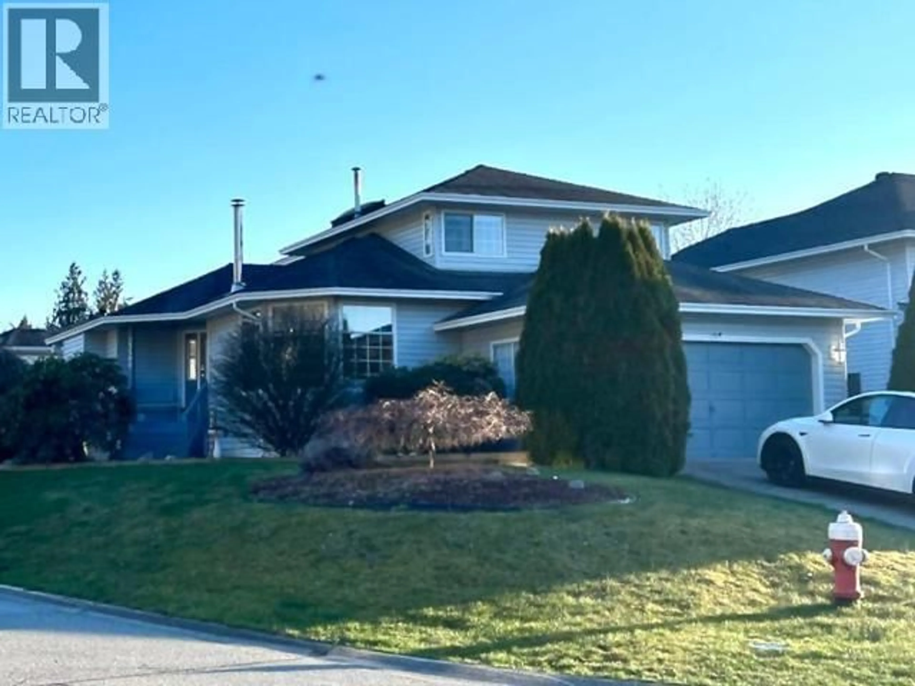 Home with vinyl exterior material, street for 23390 123 AVENUE, Maple Ridge British Columbia V2X0P7