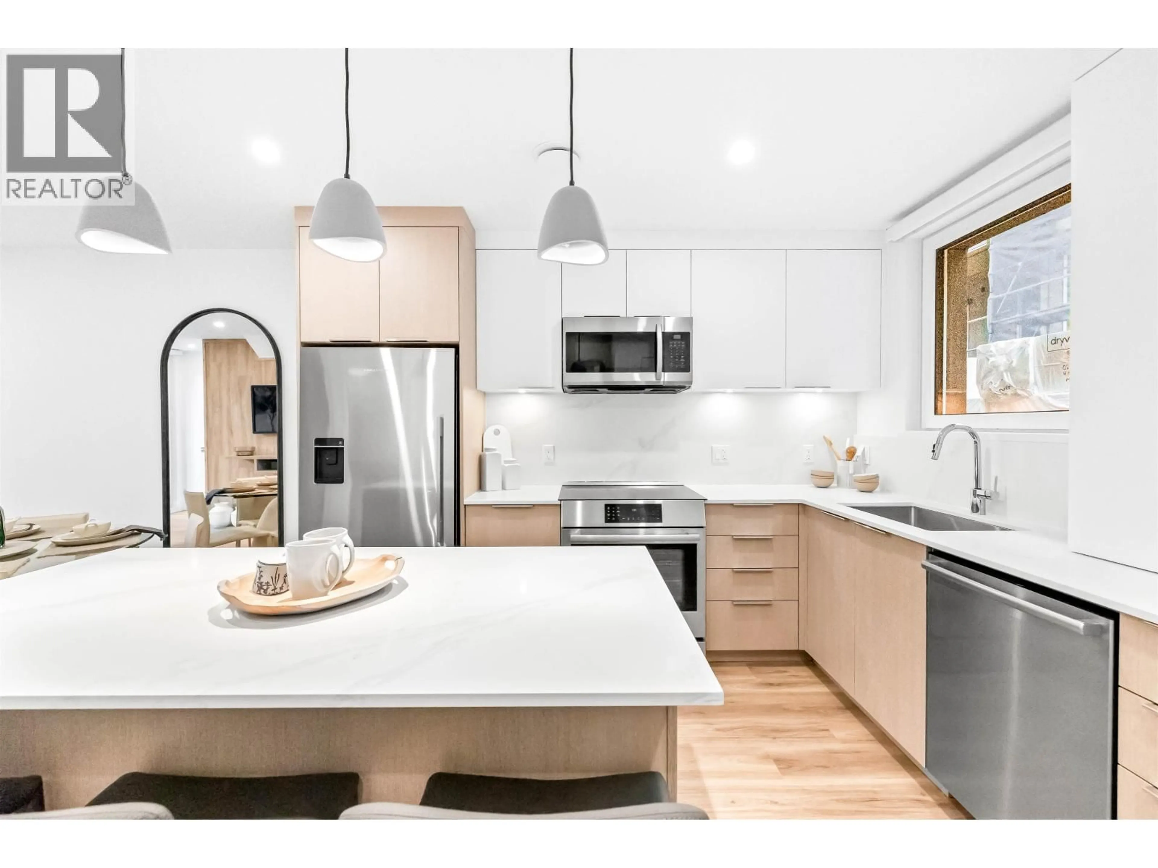 Open concept kitchen, unknown for 309 - 2250 1ST AVENUE, Vancouver British Columbia V5N1B6