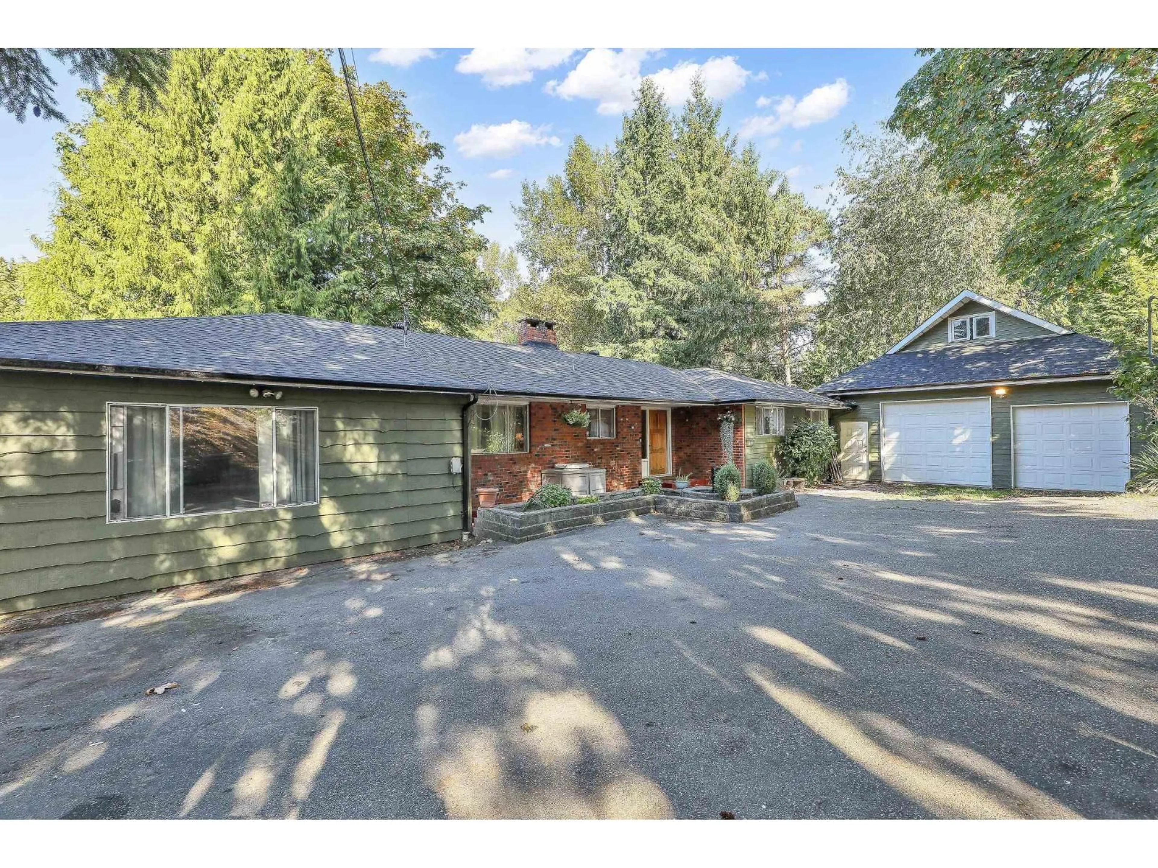 A pic from outside/outdoor area/front of a property/back of a property/a pic from drone, street for 14373 115 AVENUE, Surrey British Columbia V3R2P9