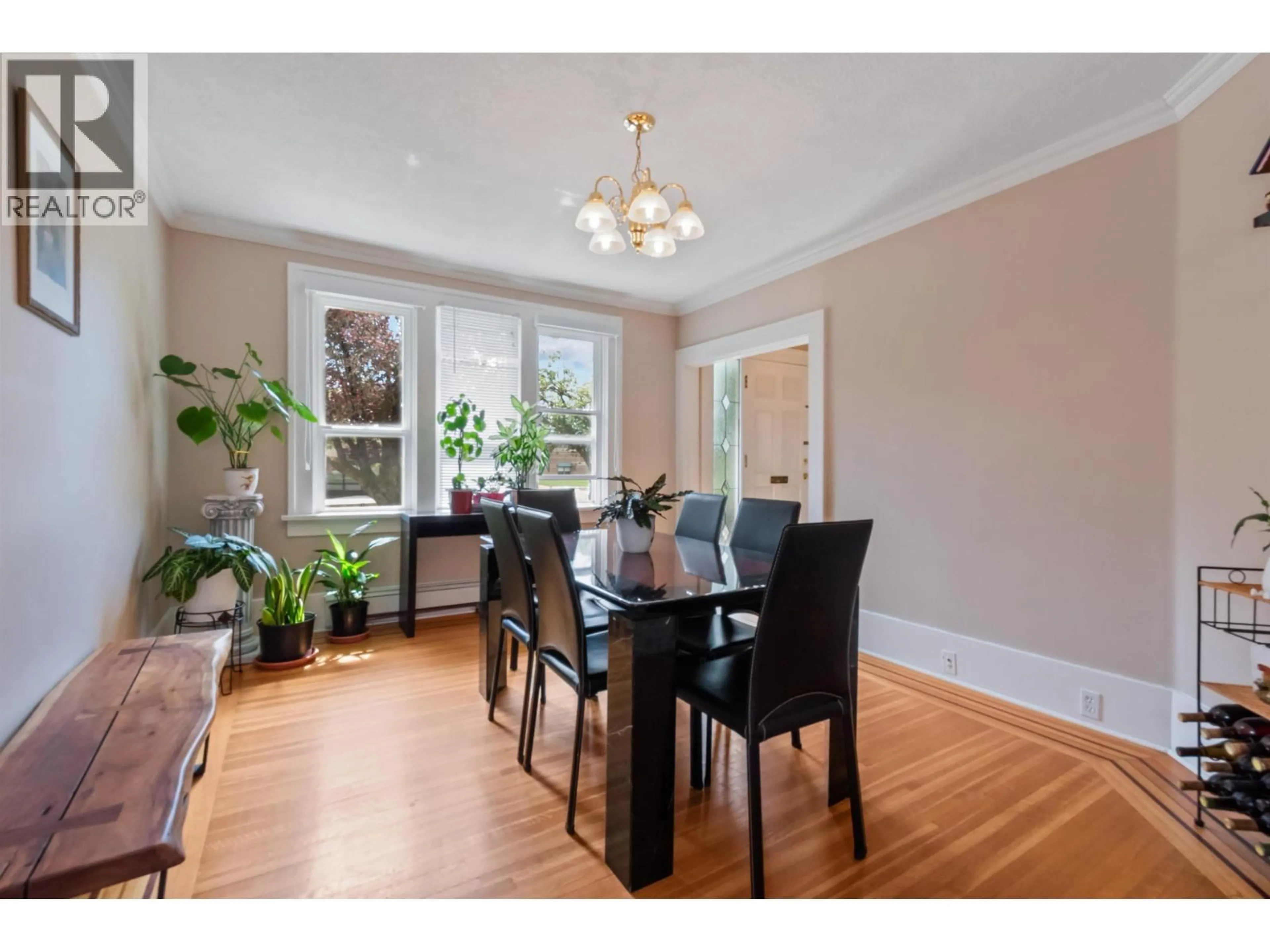 Dining room, wood/laminate floor for 1945 45TH AVENUE, Vancouver British Columbia V6M2H7