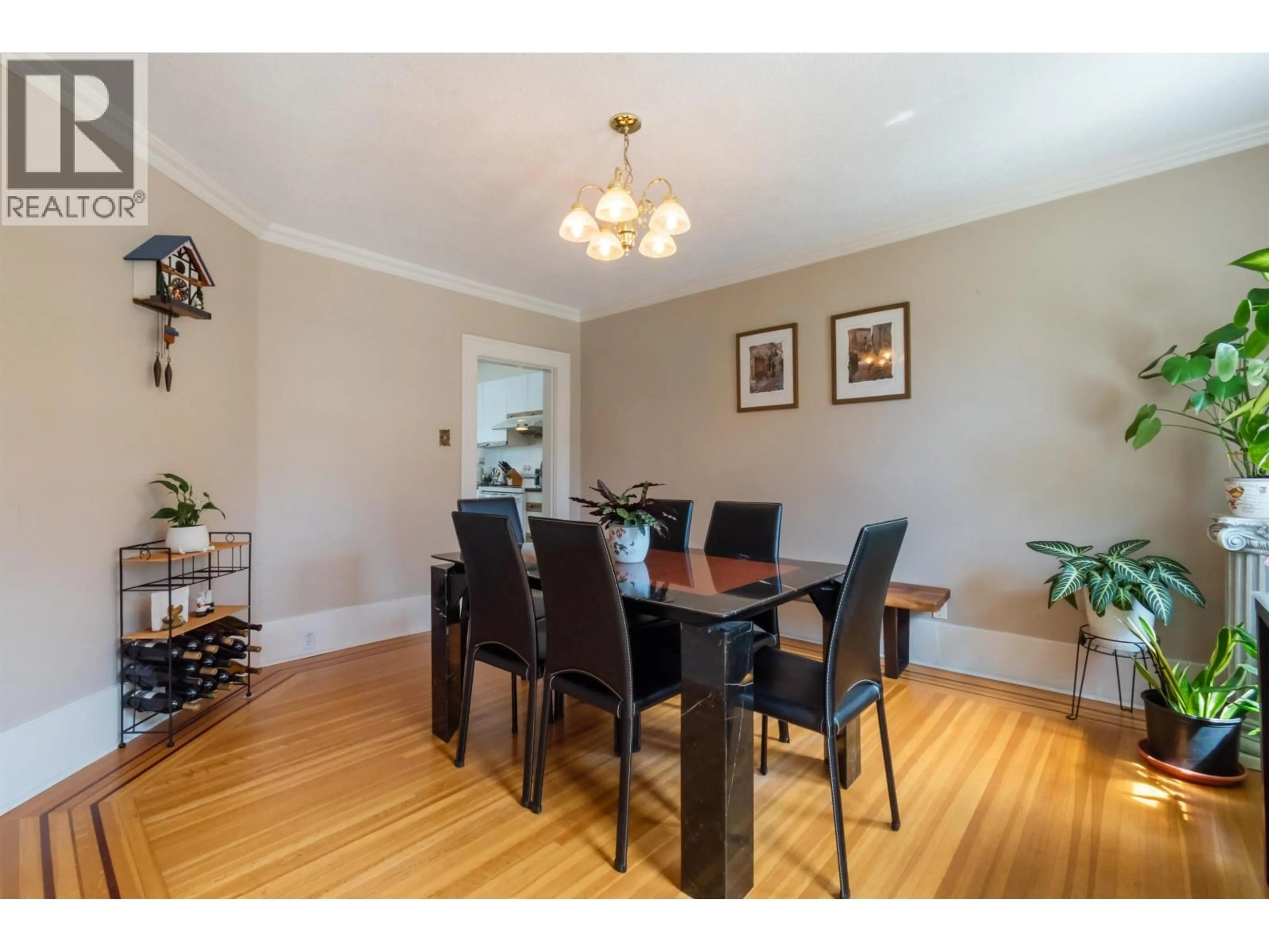 Dining room, wood/laminate floor for 1945 45TH AVENUE, Vancouver British Columbia V6M2H7