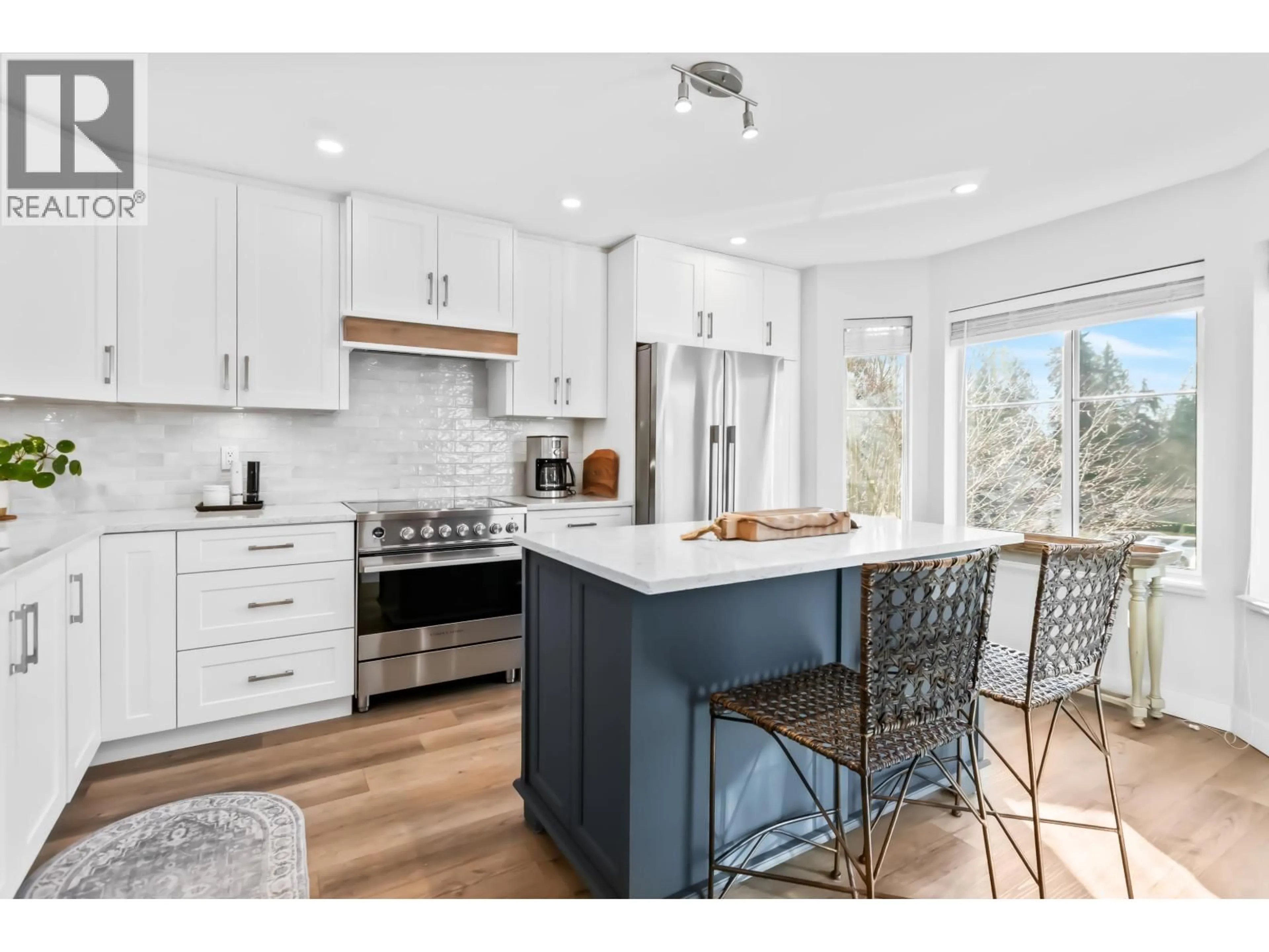 Open concept kitchen, wood/laminate floor for 18 - 22740 116 AVENUE, Maple Ridge British Columbia V2X2X7