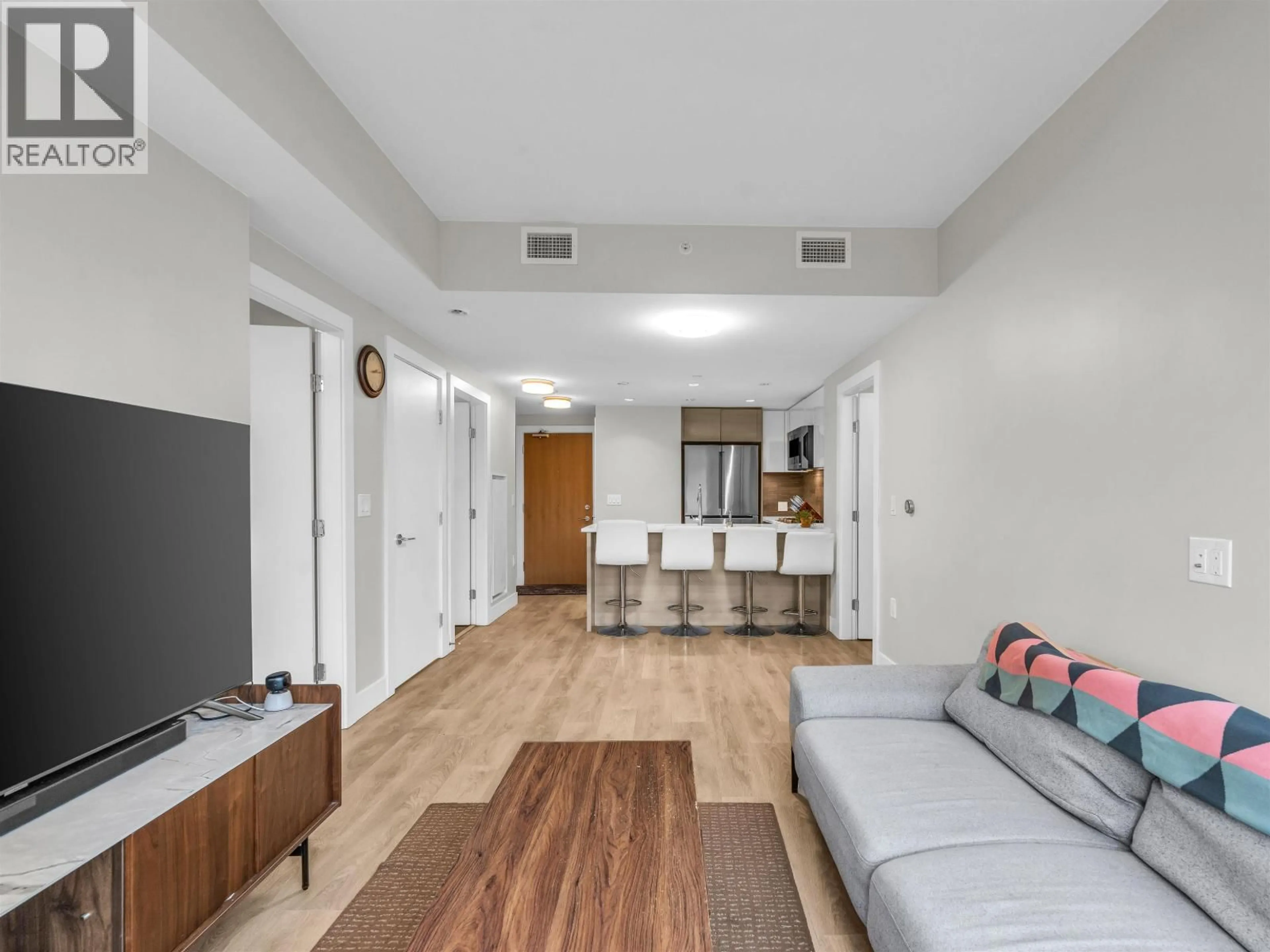 Living room with furniture, unknown for 607 - 3451 SAWMILL CRESCENT, Vancouver British Columbia V5S0H3