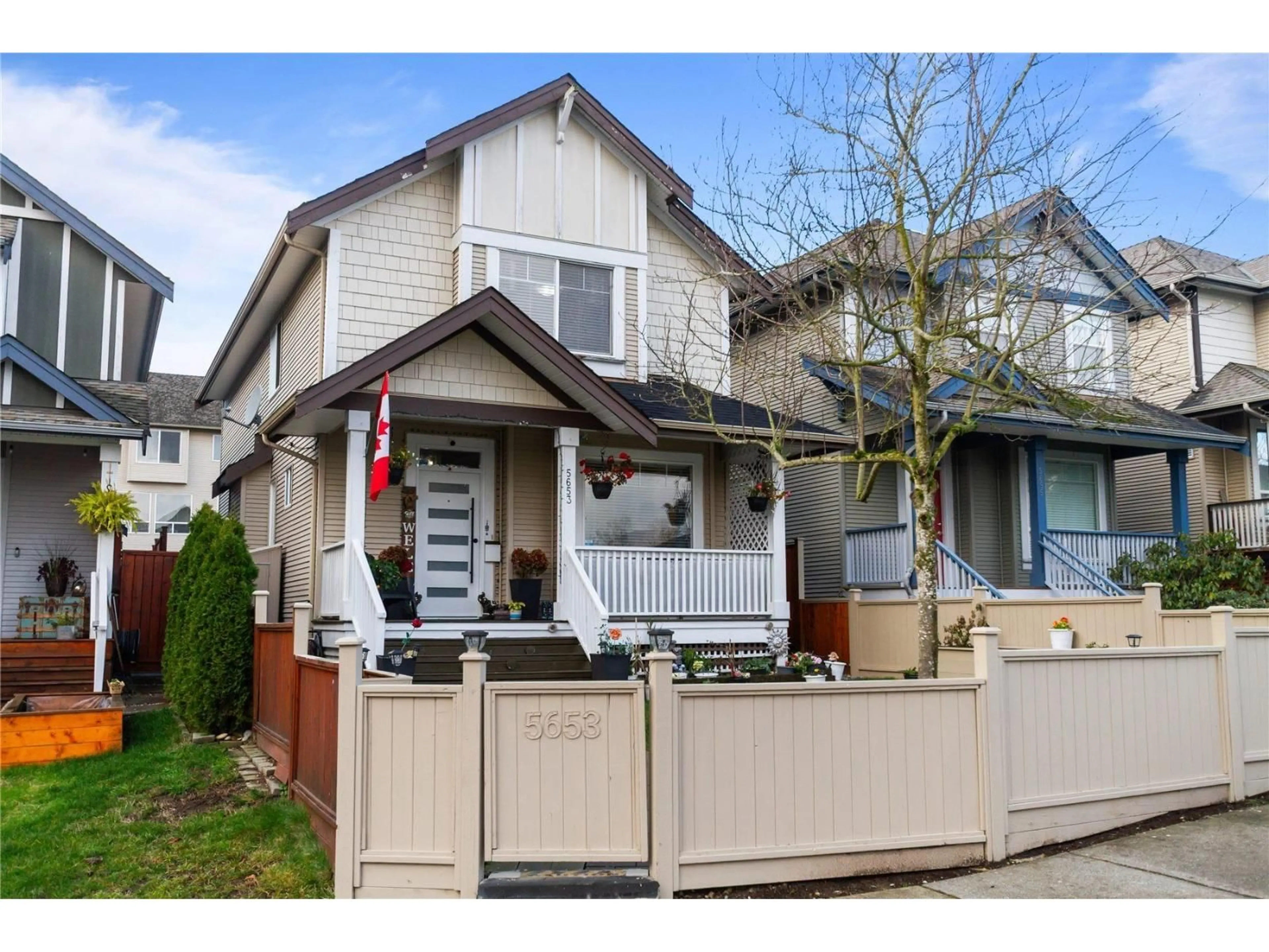 Home with vinyl exterior material, street for 5653 148A STREET, Surrey British Columbia V3S8W8