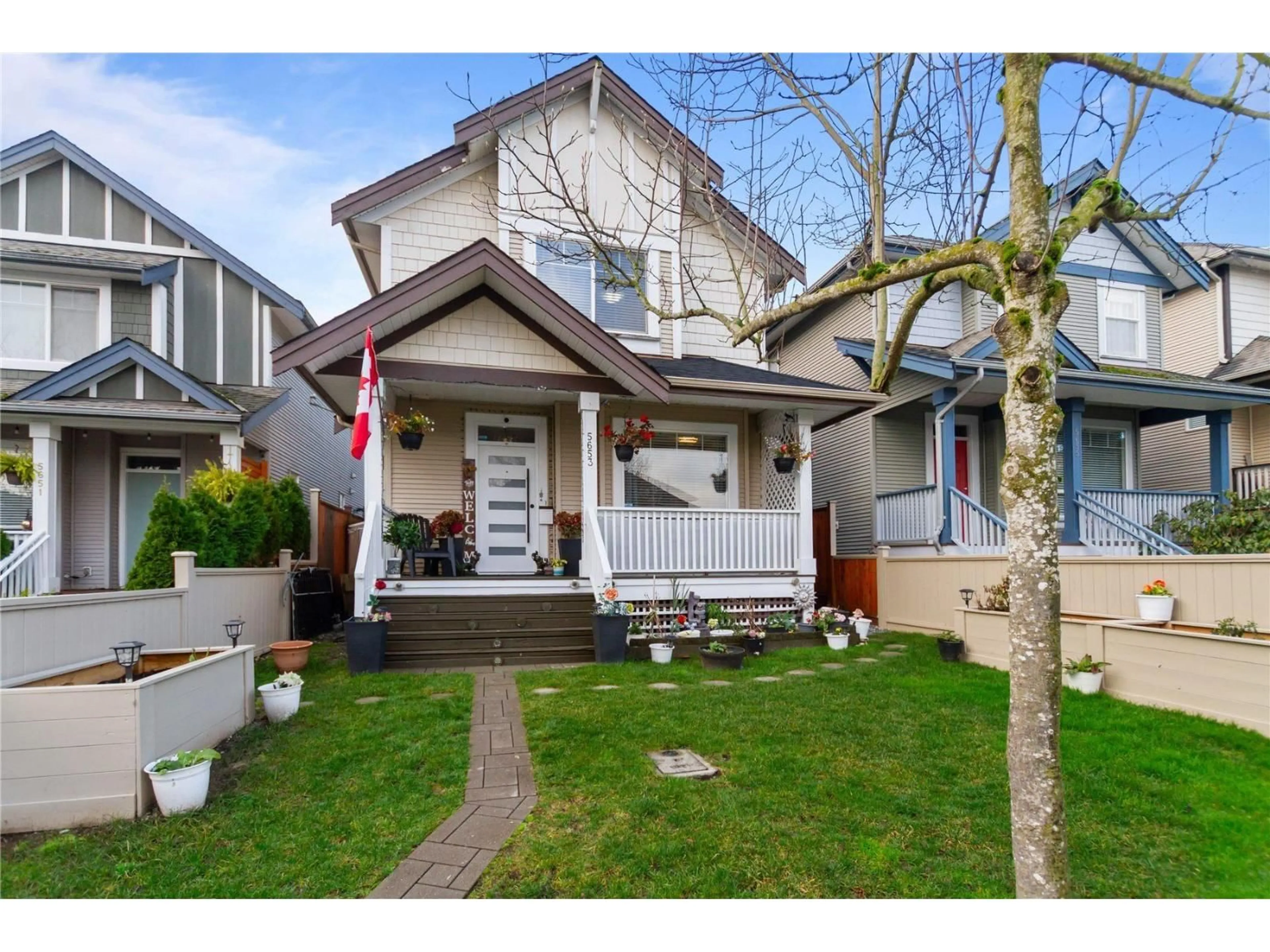 Home with vinyl exterior material, street for 5653 148A STREET, Surrey British Columbia V3S8W8