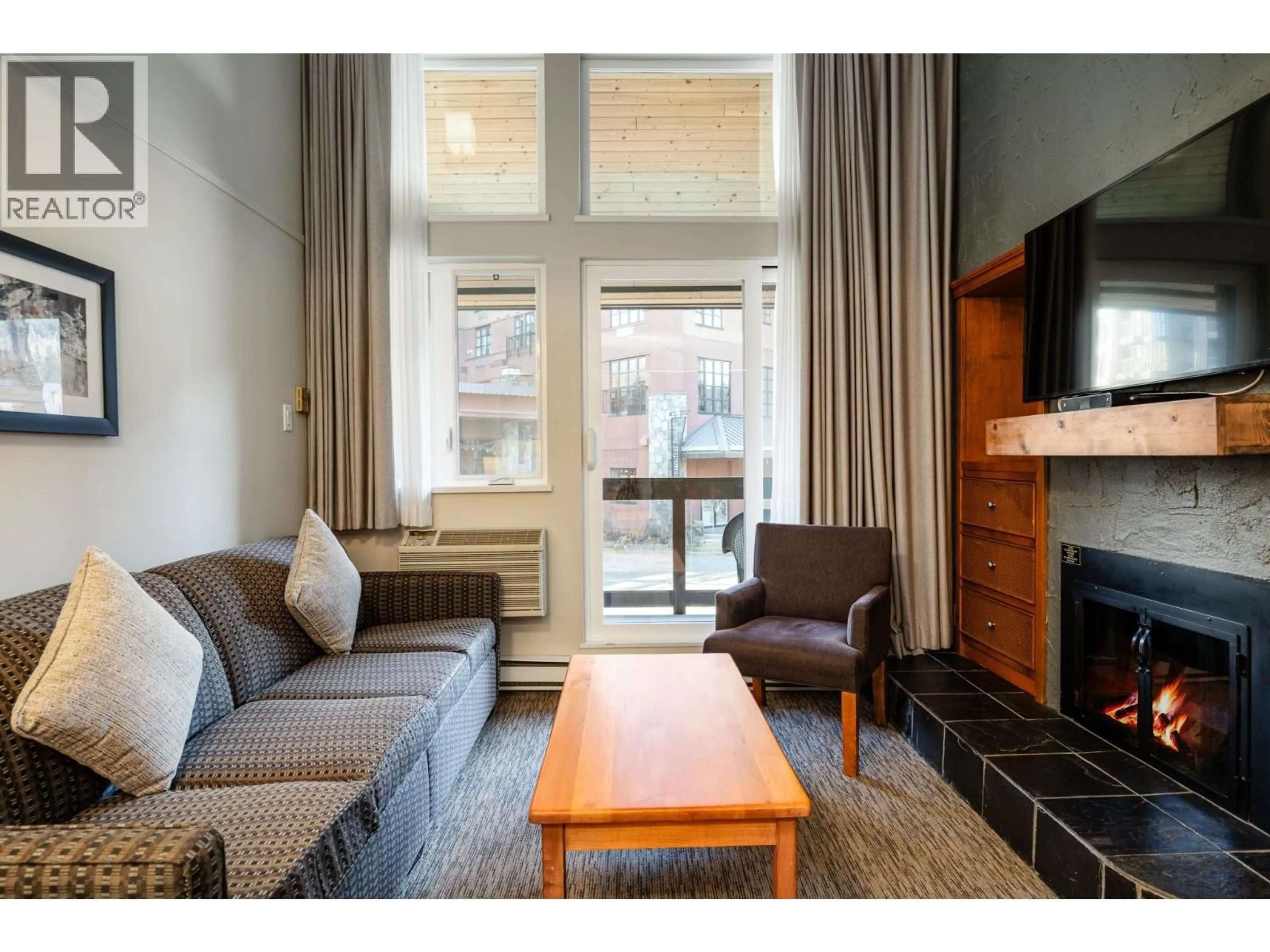 Living room with furniture, unknown for 210 - 4420 SUNDIAL PLACE, Whistler British Columbia V8E1G6