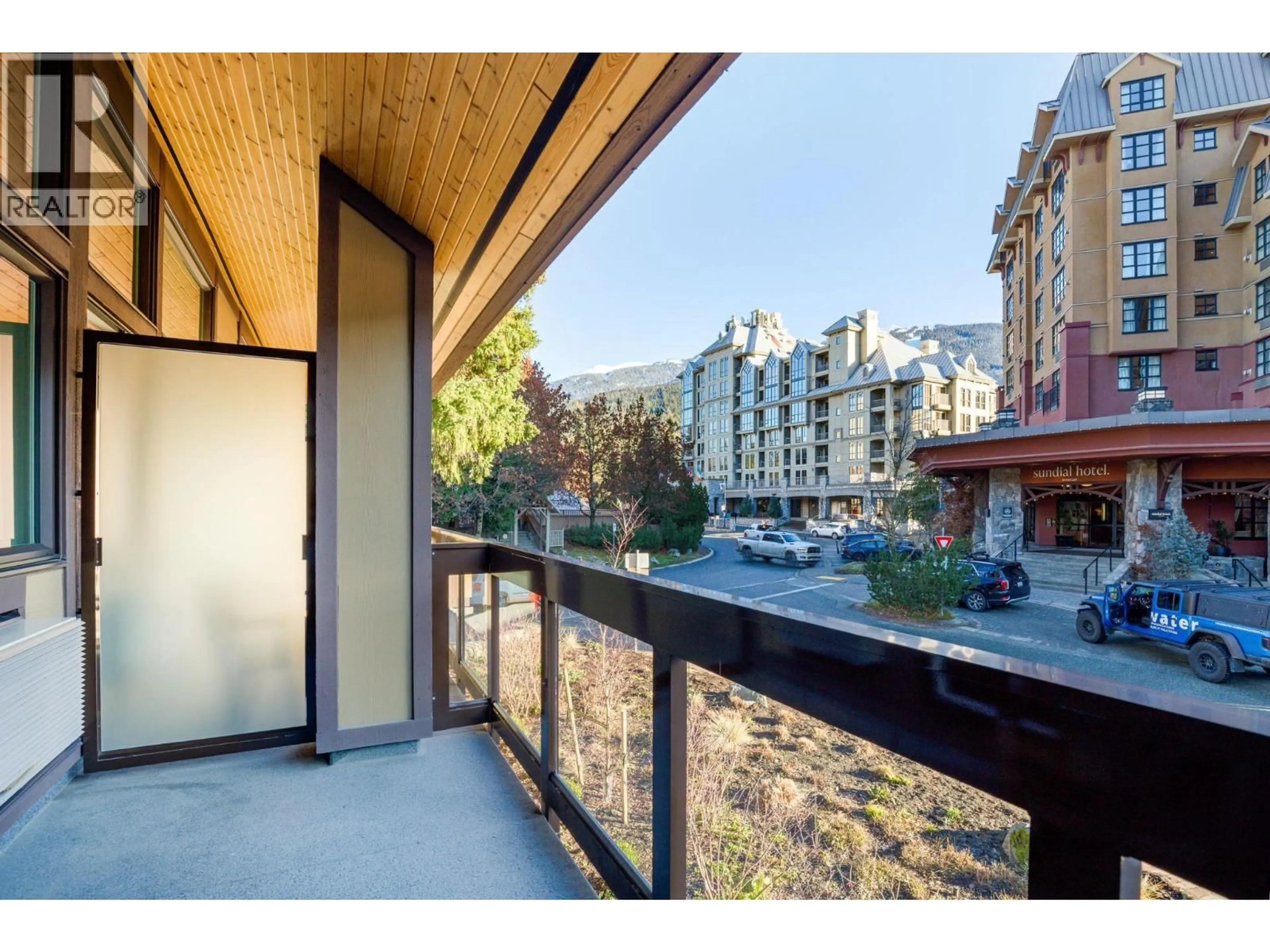 Balcony in the apartment, city buildings view from balcony for 210 - 4420 SUNDIAL PLACE, Whistler British Columbia V8E1G6