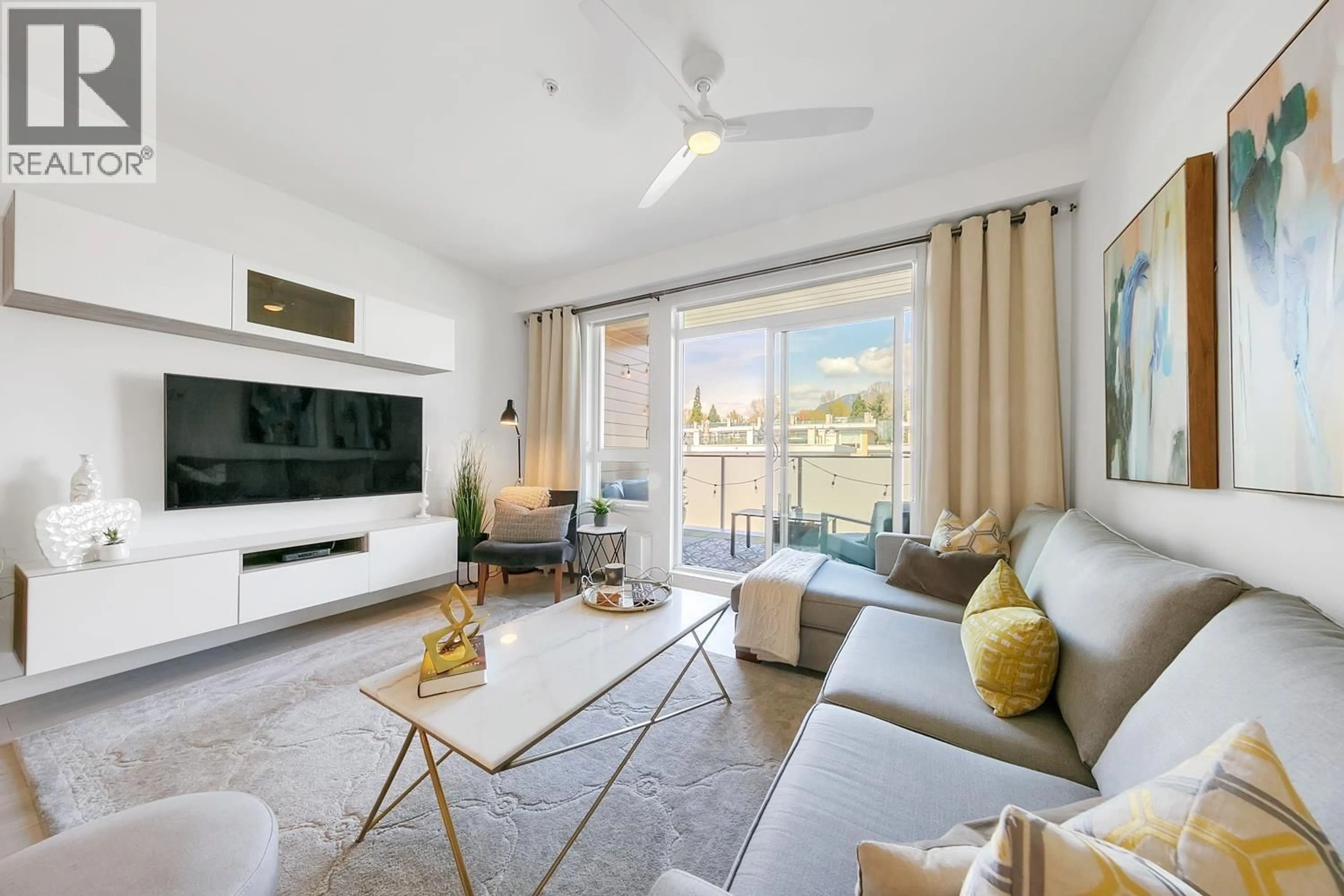 Living room with furniture, unknown for 410 - 711 14TH STREET, North Vancouver British Columbia V7M3E8