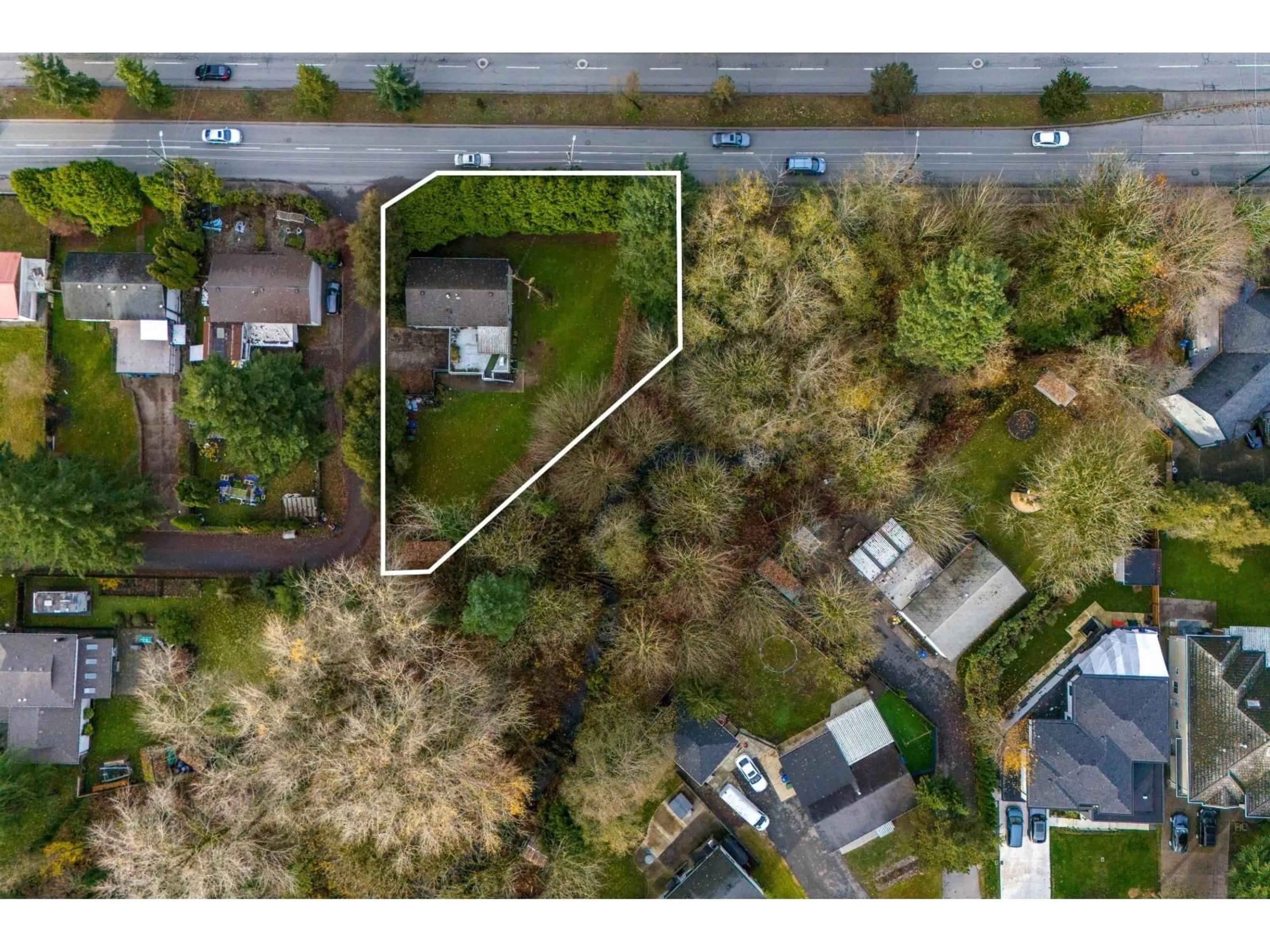 A pic from outside/outdoor area/front of a property/back of a property/a pic from drone, street for 14908 88 AVENUE, Surrey British Columbia V3S2S5