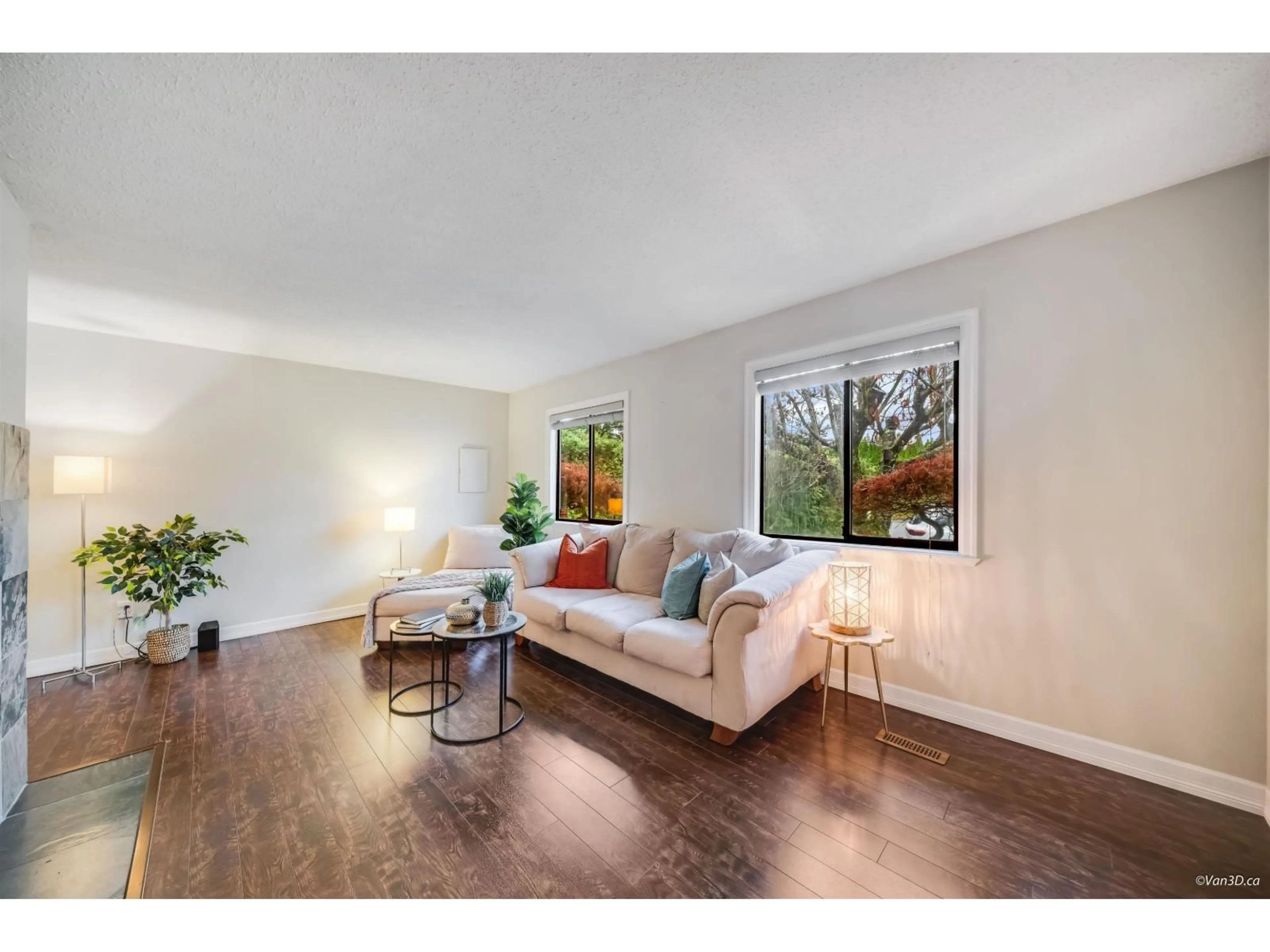 Living room with furniture, wood/laminate floor for 1831 KEYS PLACE, Abbotsford British Columbia V2S5G9