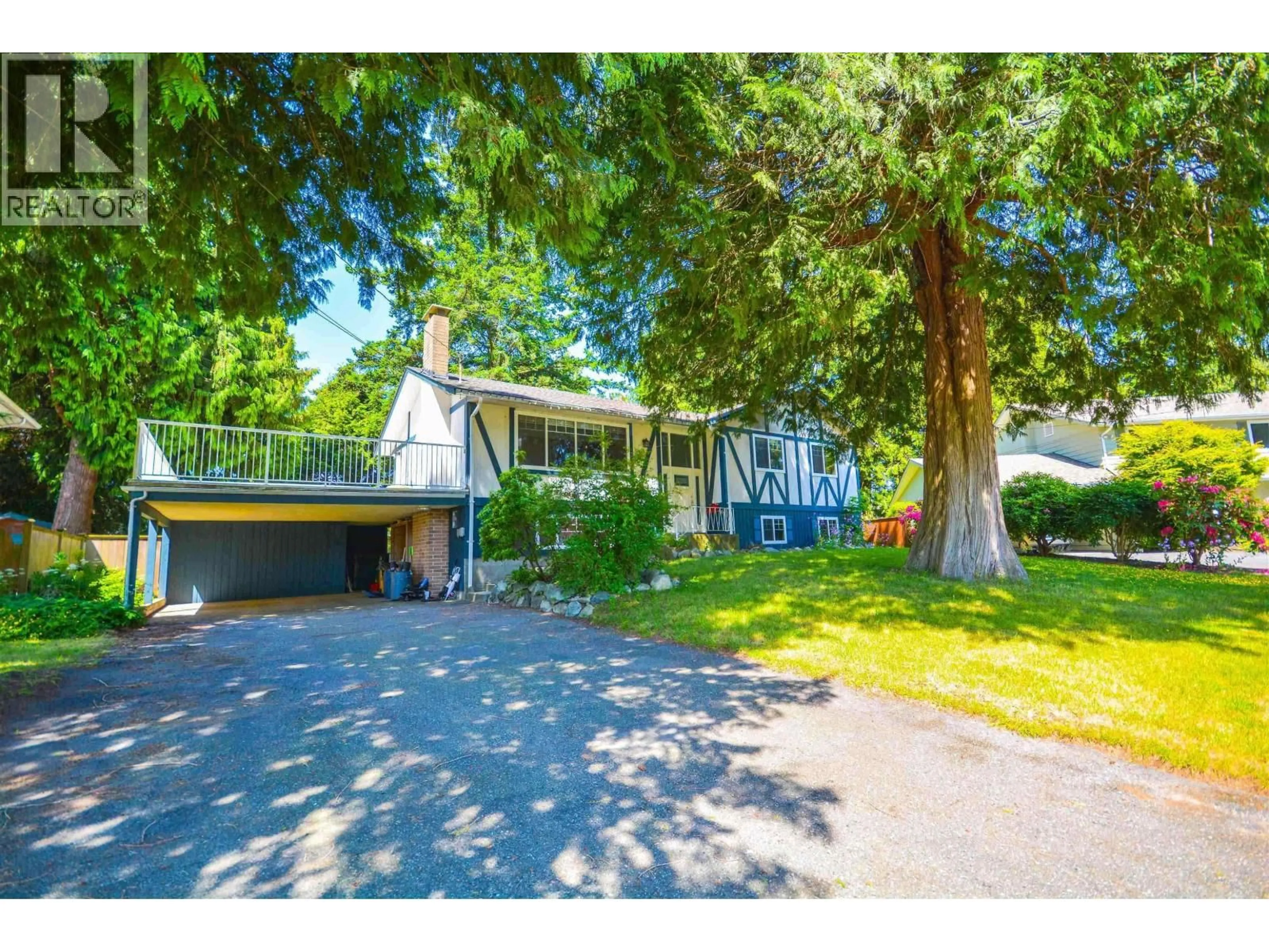 A pic from outside/outdoor area/front of a property/back of a property/a pic from drone, street for 1409 WINDSOR CRESCENT, Delta British Columbia V4M3C3