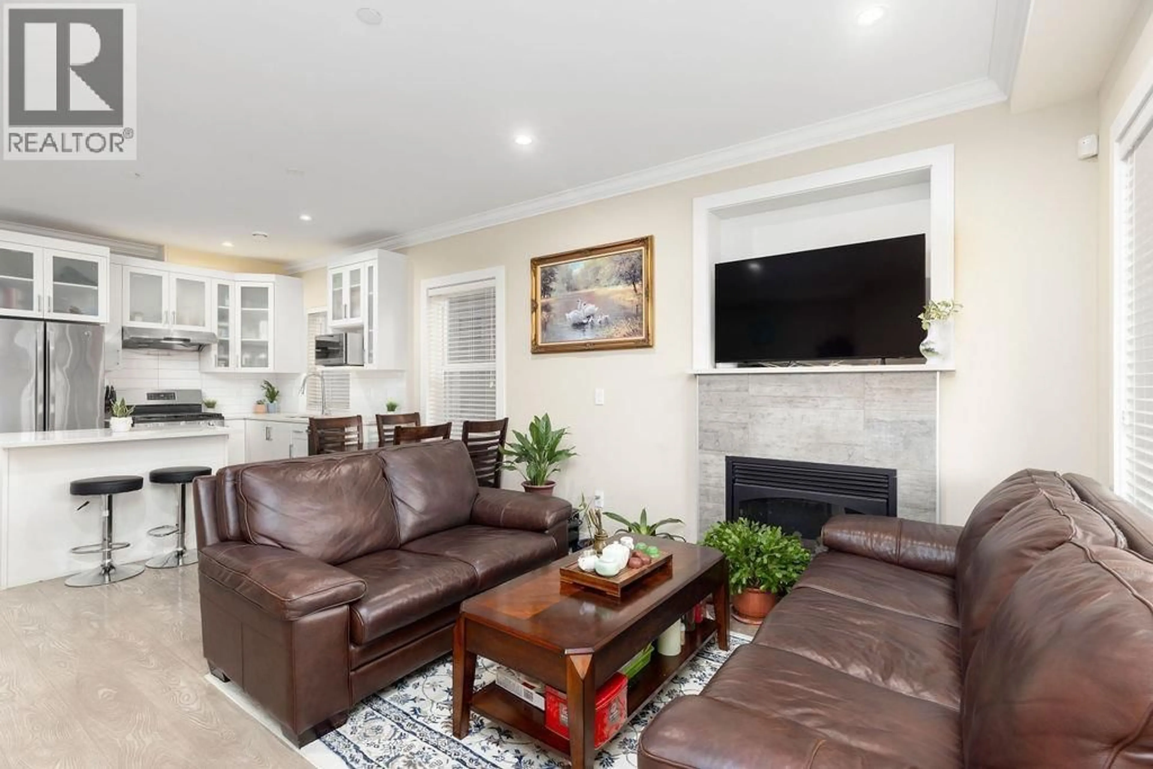 Living room with furniture, unknown for 201 - 4577 SLOCAN STREET, Vancouver British Columbia V5R1Z8