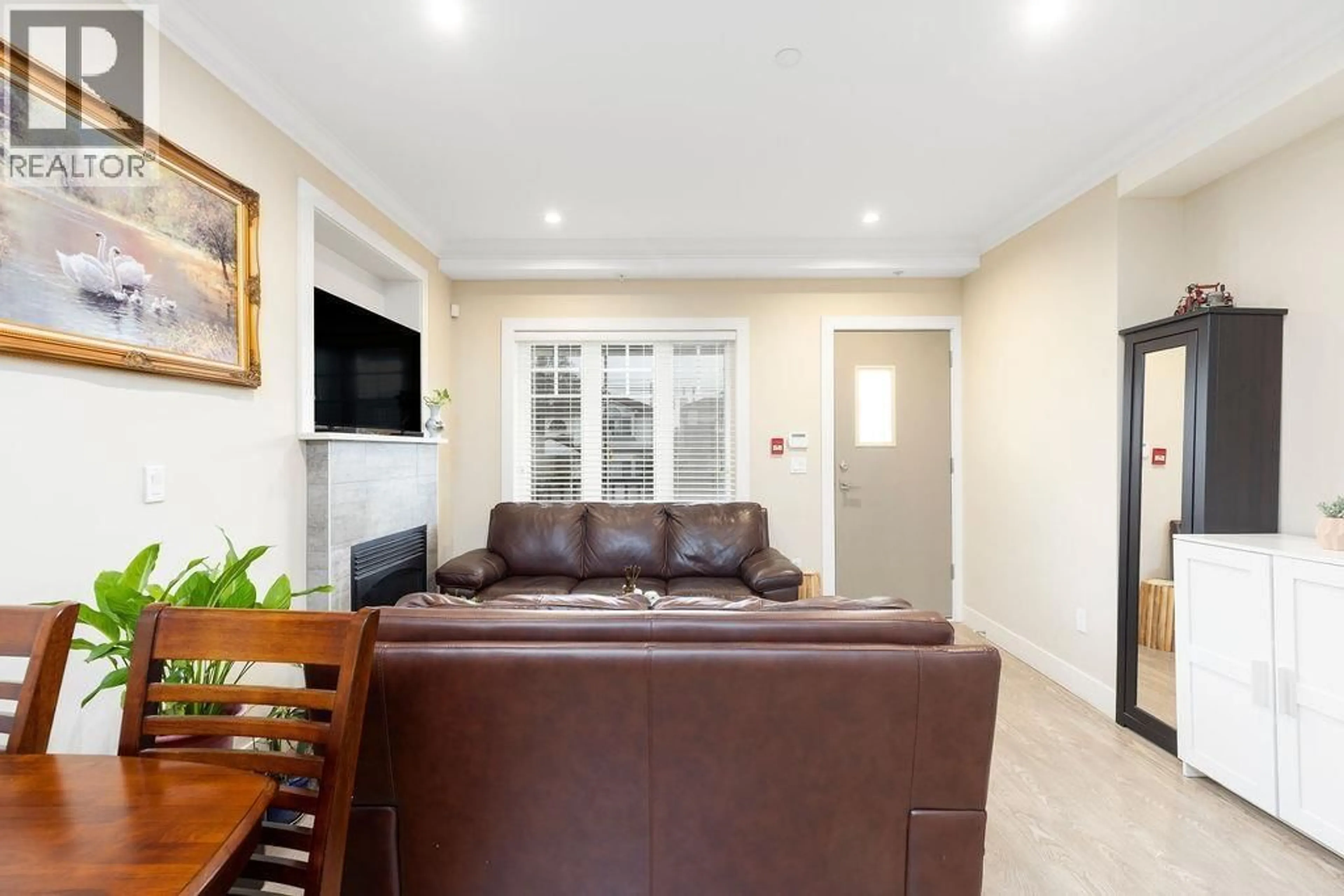 Living room with furniture, unknown for 201 - 4577 SLOCAN STREET, Vancouver British Columbia V5R1Z8