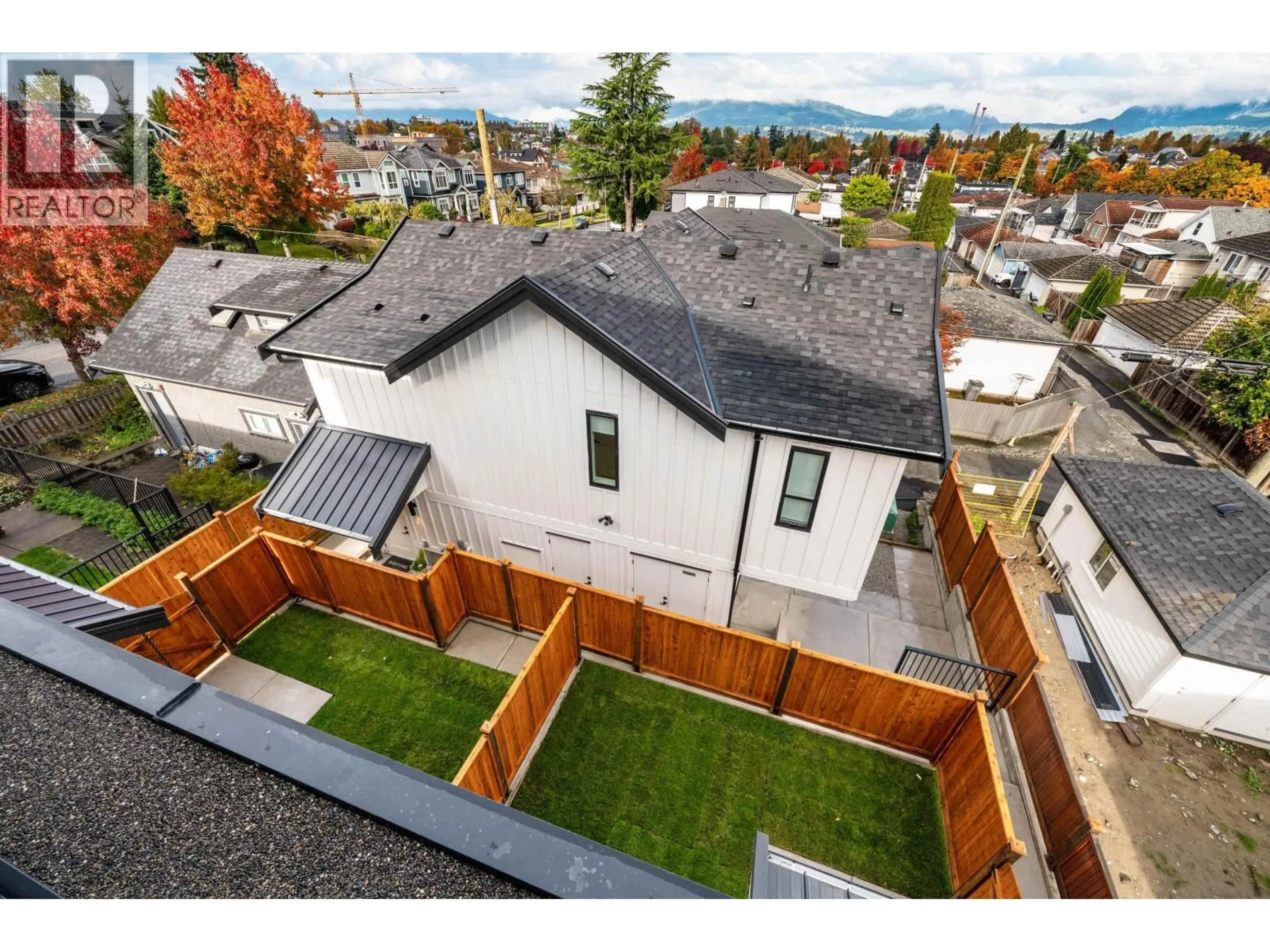 A pic from outside/outdoor area/front of a property/back of a property/a pic from drone, mountain view for 3 - 3065 CHARLES STREET, Vancouver British Columbia V5K3B6