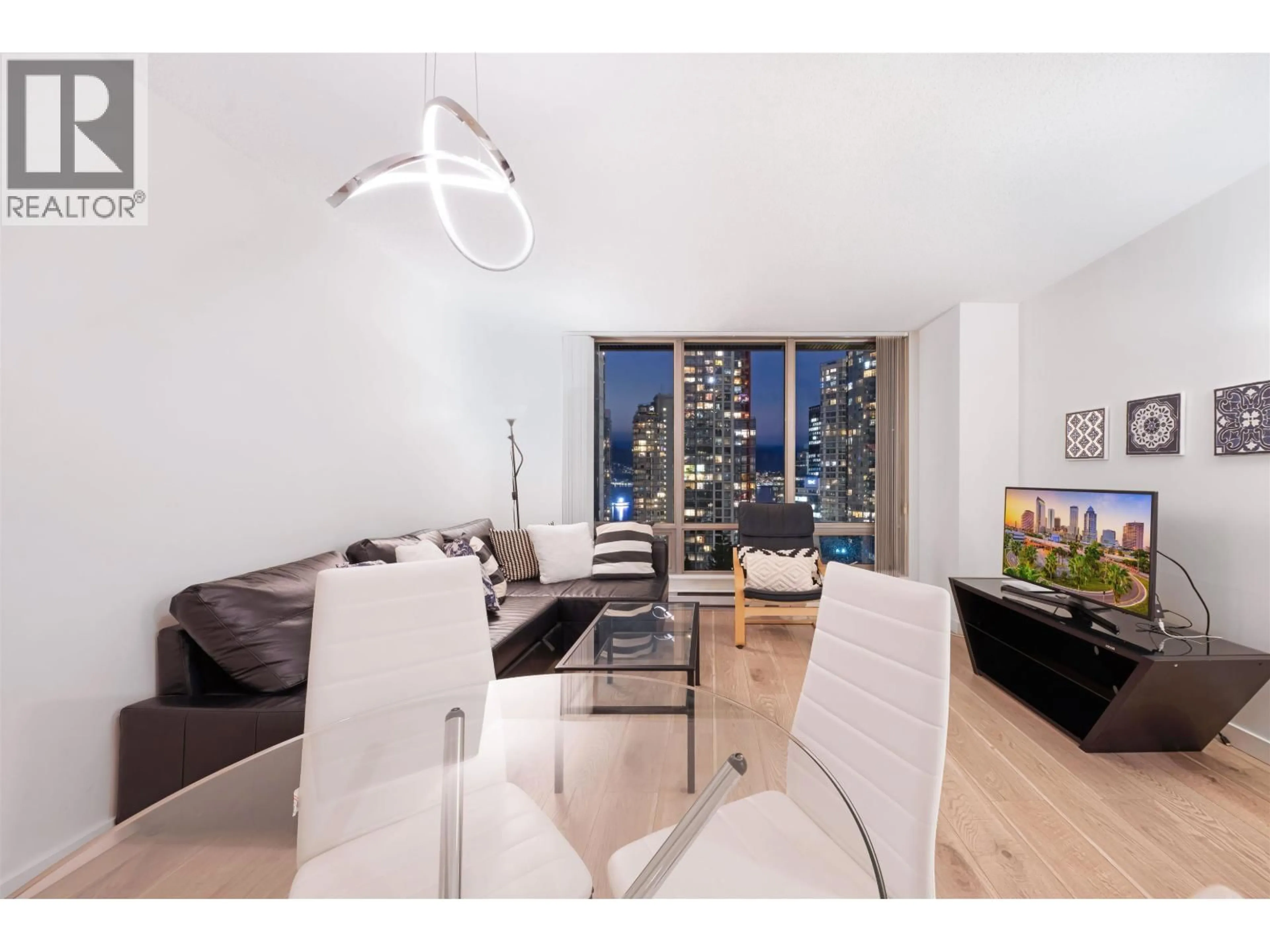 Living room with furniture, wood/laminate floor for 1203 - 1200 GEORGIA STREET, Vancouver British Columbia V6E4R2