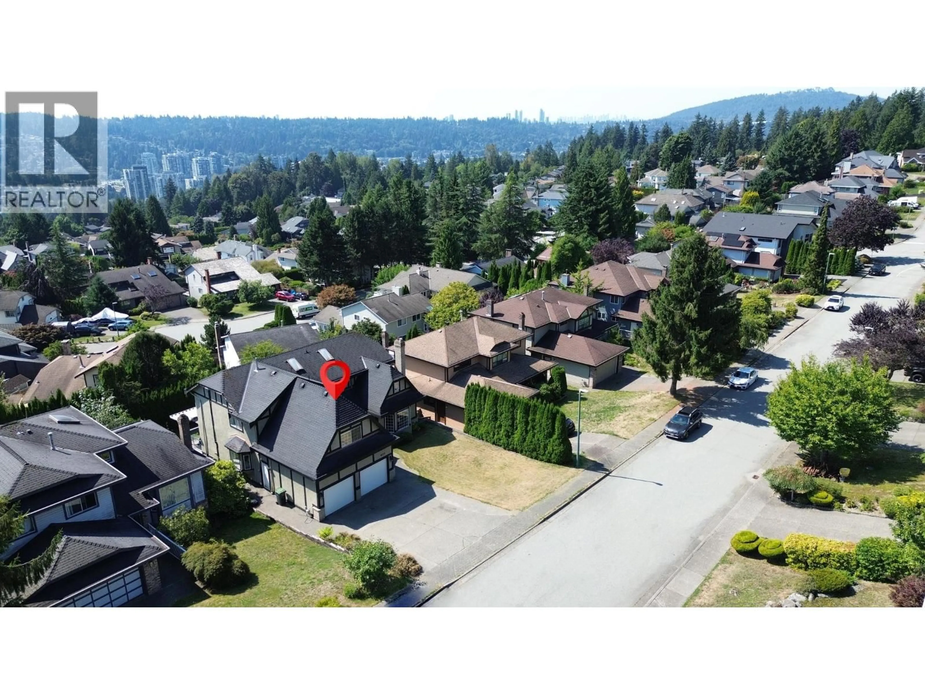 A pic from outside/outdoor area/front of a property/back of a property/a pic from drone, mountain view for 2562 FUCHSIA PLACE, Coquitlam British Columbia V3E2M7