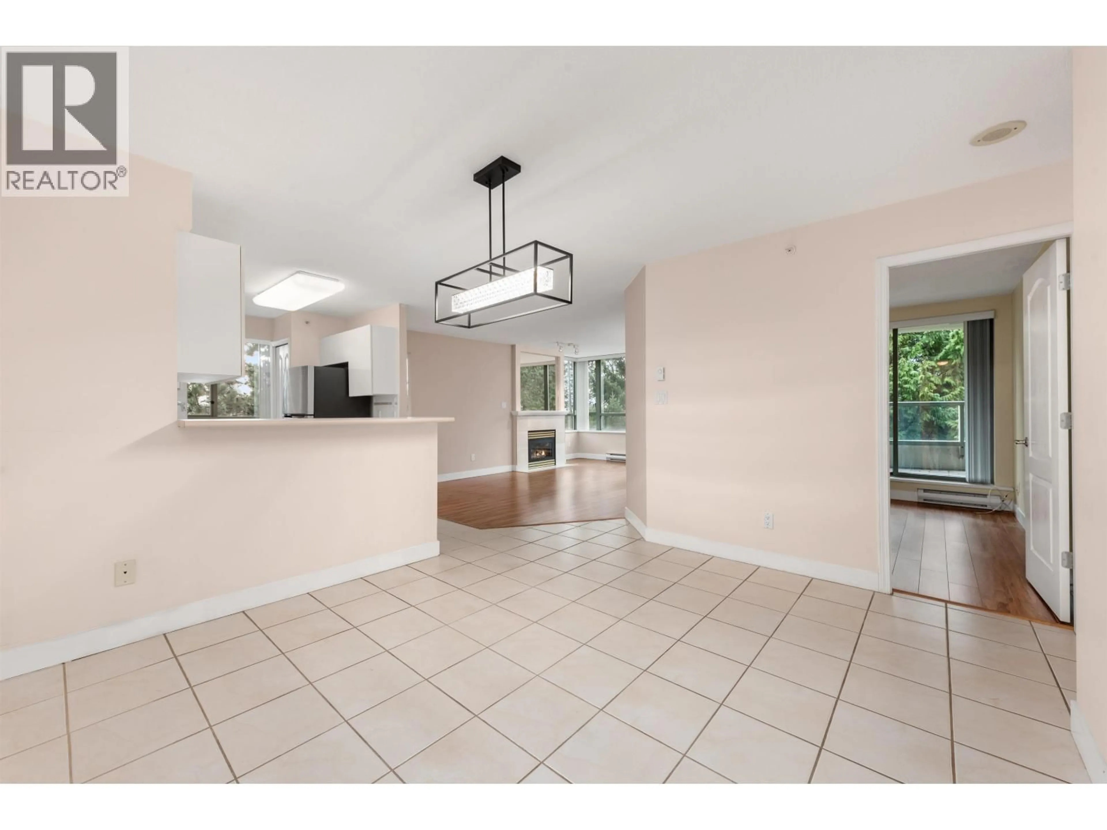 Open concept kitchen, ceramic/tile floor for 306 - 6622 SOUTHOAKS CRESCENT, Burnaby British Columbia V5E4K2