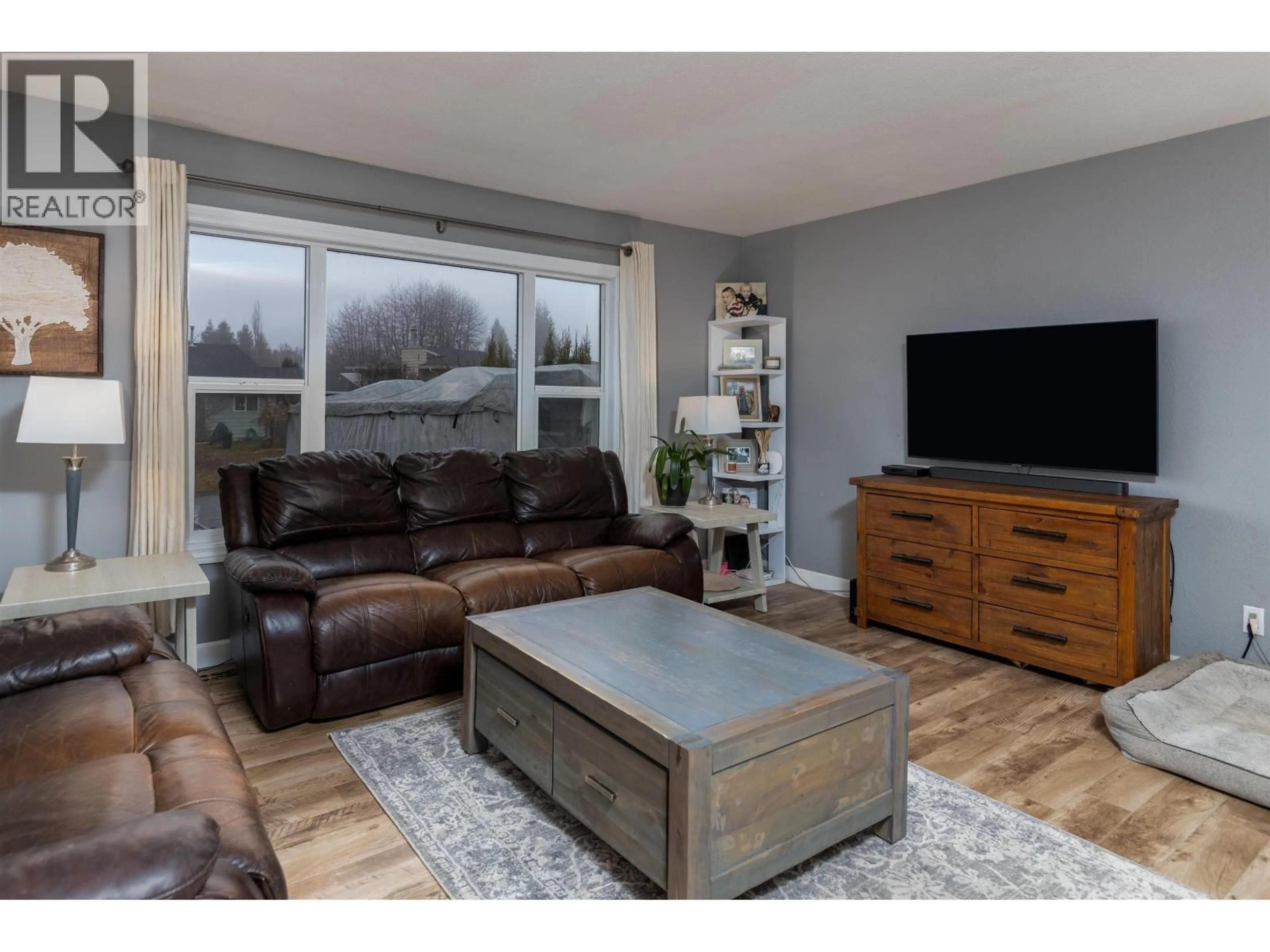 Living room with furniture, wood/laminate floor for 5331 MOUNTAIN VISTA DRIVE, Terrace British Columbia V8G4X4
