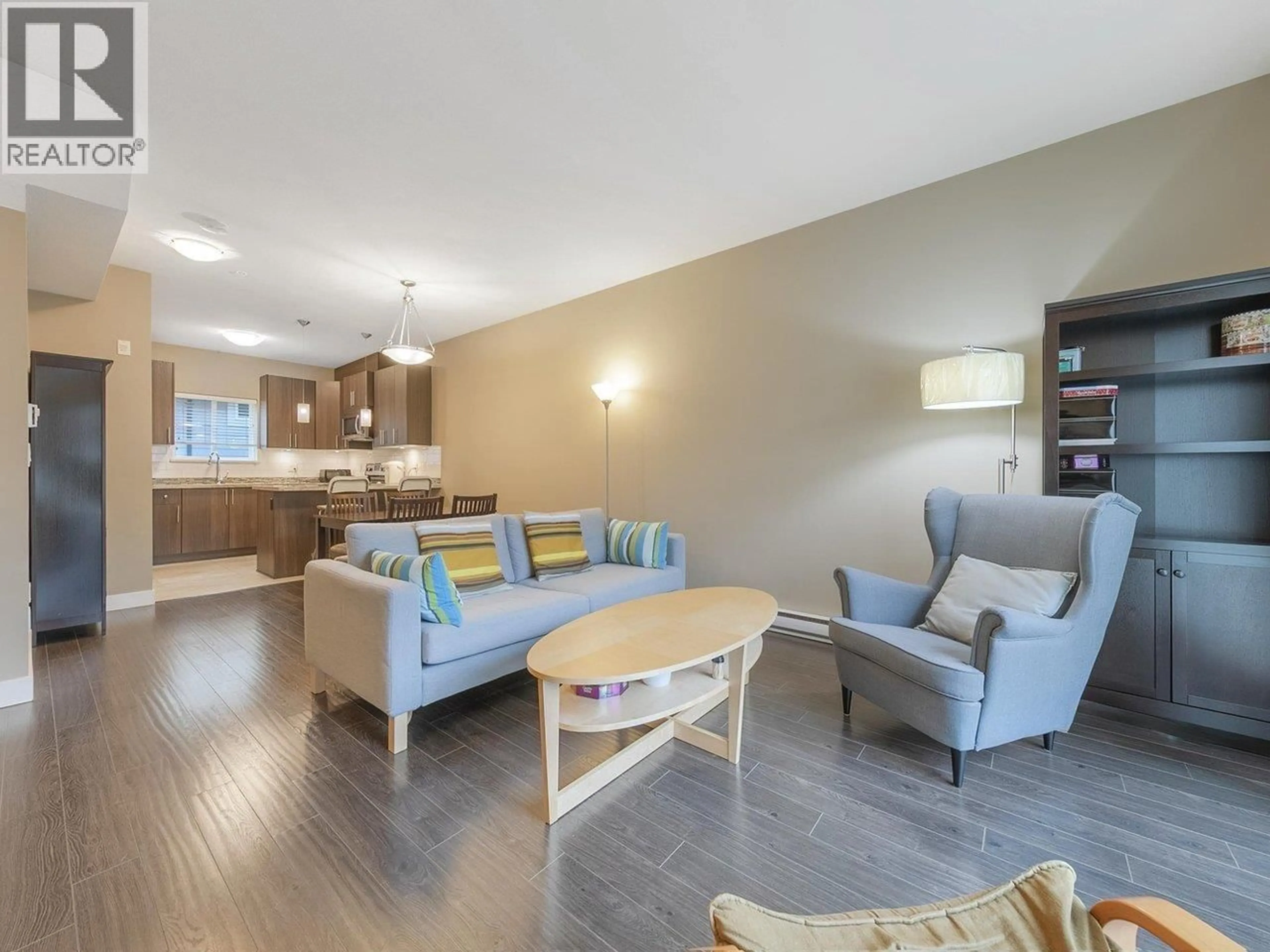 Living room with furniture, wood/laminate floor for 226 - 3888 NORFOLK STREET, Burnaby British Columbia V5G1E5