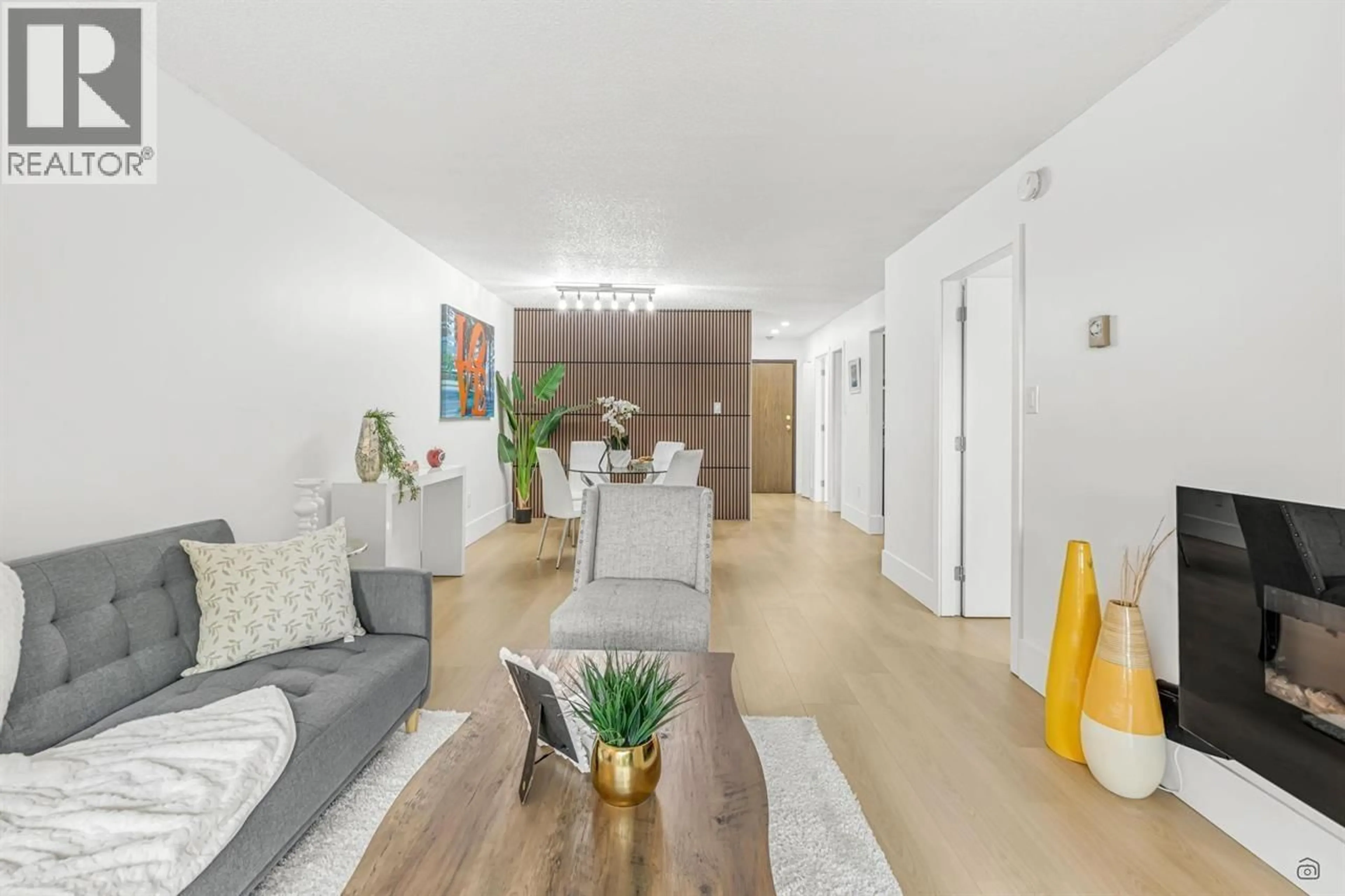 Living room with furniture, wood/laminate floor for 207 - 37 AGNES STREET, New Westminster British Columbia V3L5G9