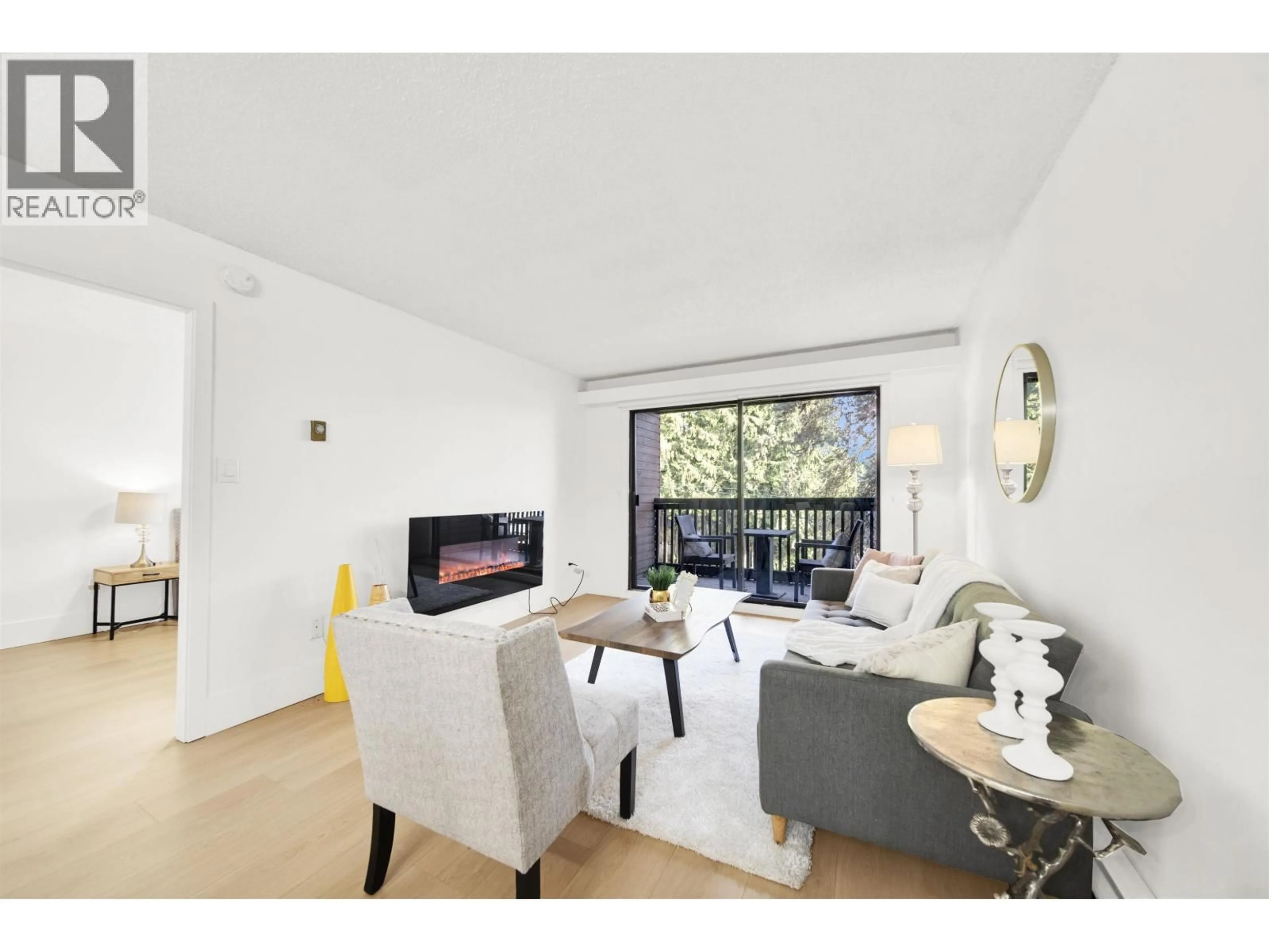 Living room with furniture, wood/laminate floor for 207 - 37 AGNES STREET, New Westminster British Columbia V3L5G9