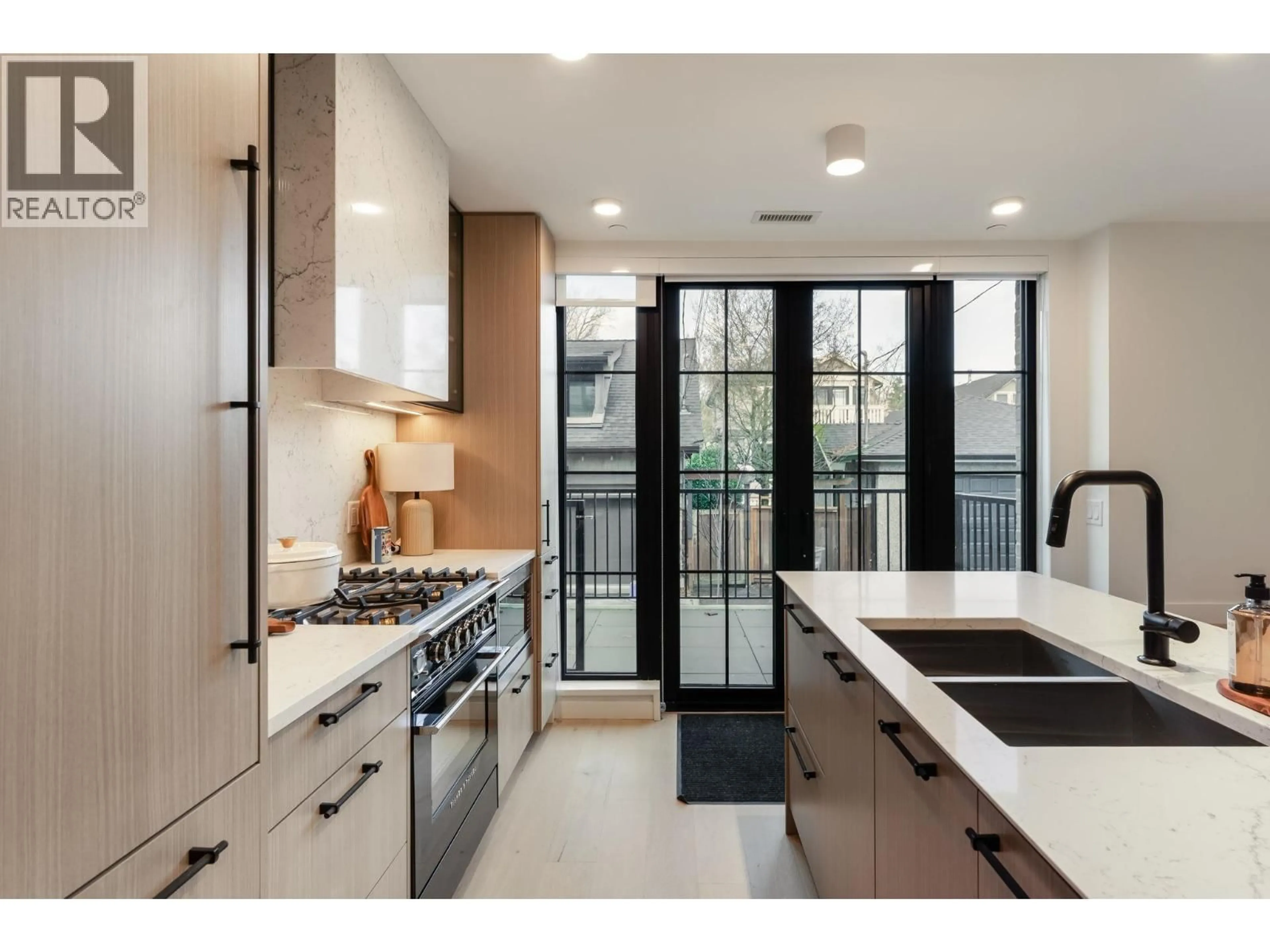 Contemporary kitchen, unknown for 197 KING EDWARD AVE STREET, Vancouver British Columbia V5Y4B4