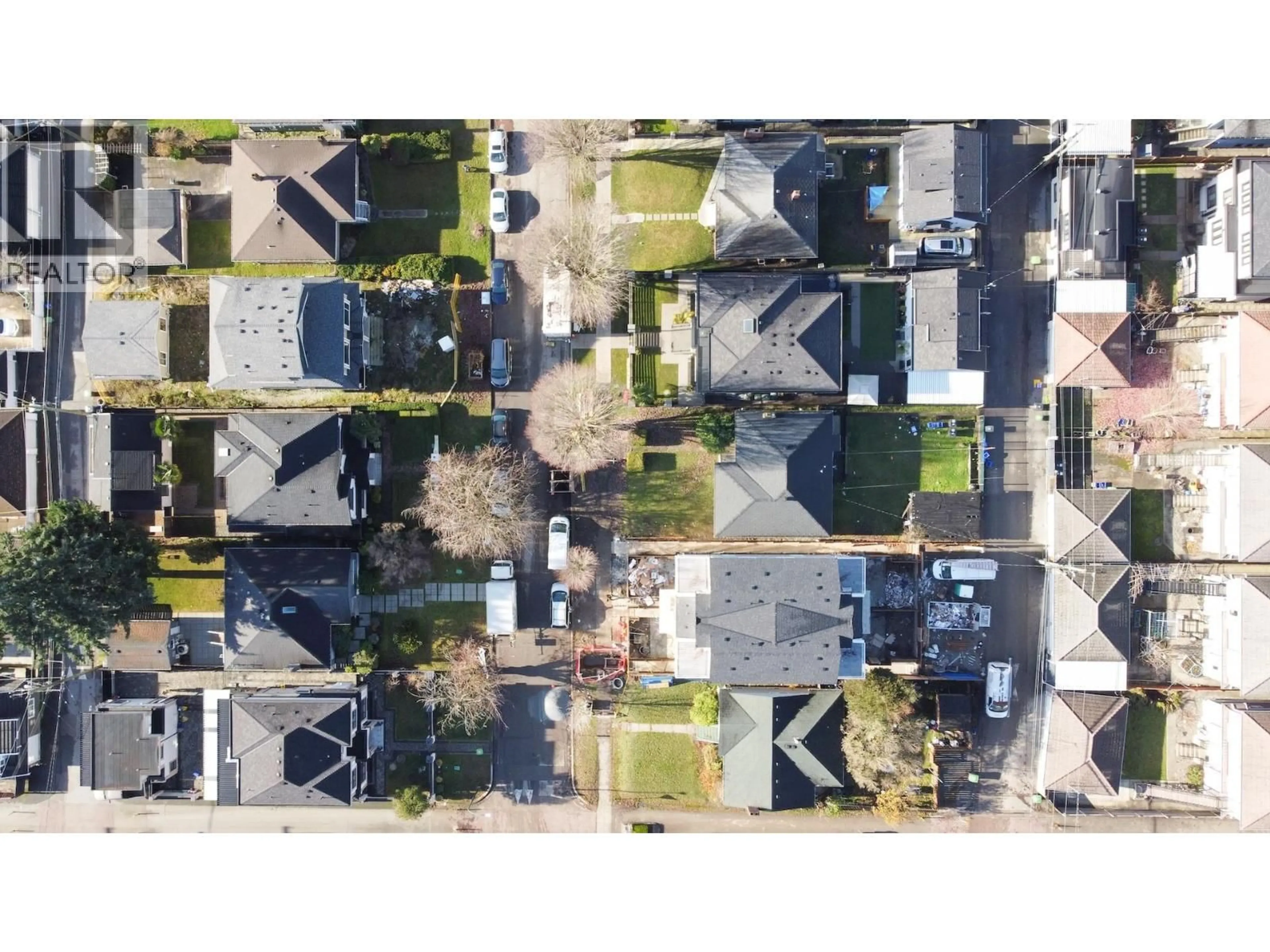 A pic from outside/outdoor area/front of a property/back of a property/a pic from drone, street for 1563 58TH AVENUE, Vancouver British Columbia V5P2C1