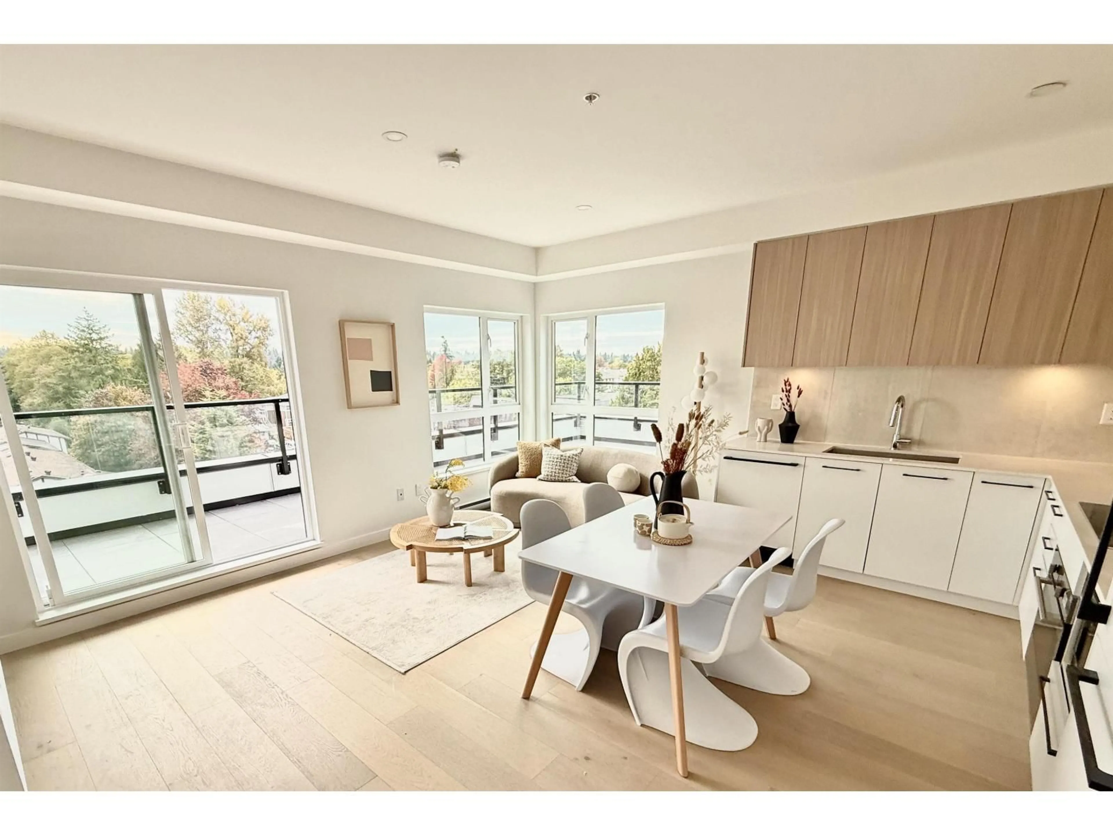 Open concept kitchen, wood/laminate floor for 501 - 5398 207 STREET, Langley British Columbia V3A2G1