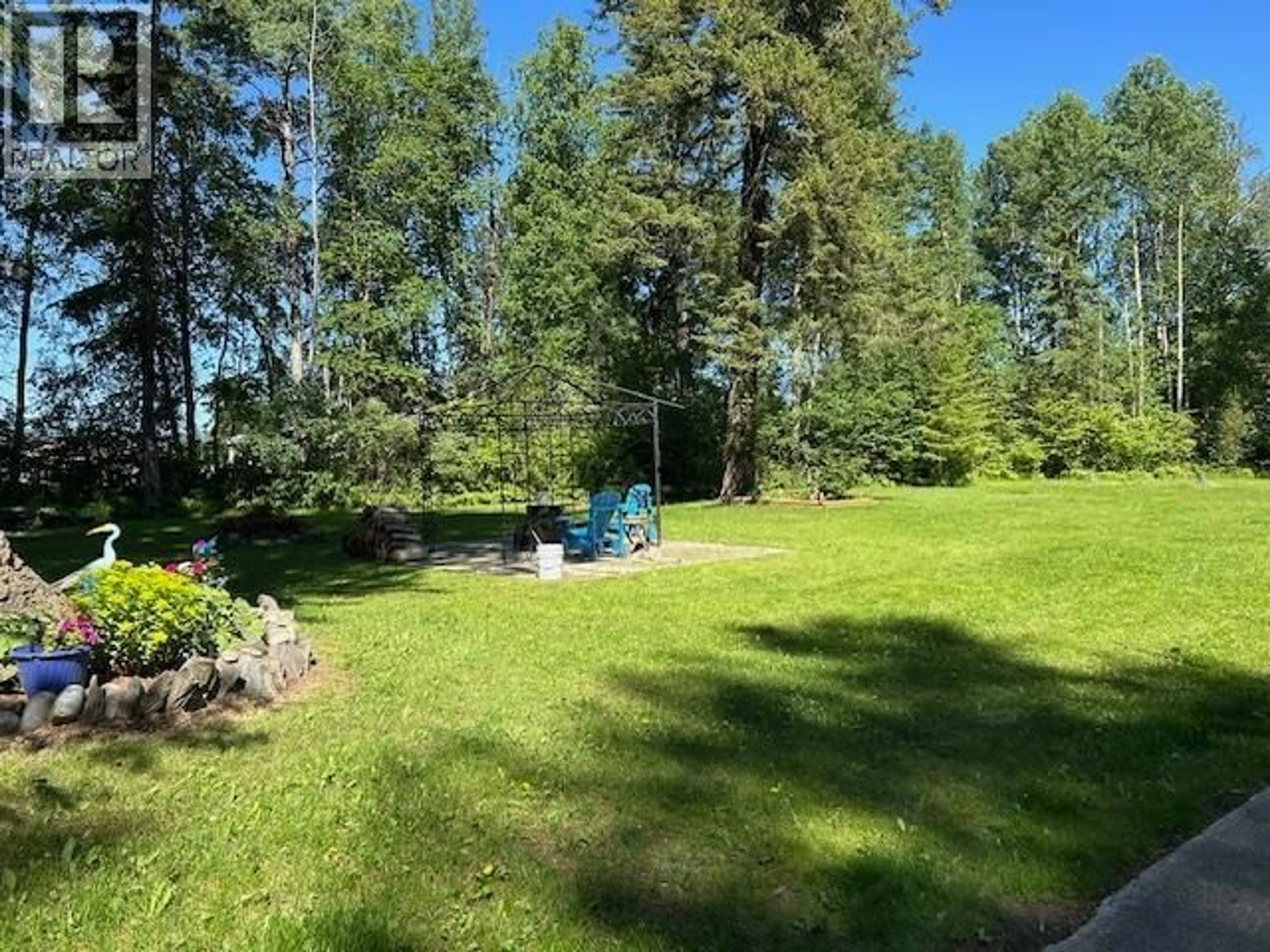 A pic from outside/outdoor area/front of a property/back of a property/a pic from drone, forest/trees view for 637 WILLOW STREET, Quesnel British Columbia V2J3T2