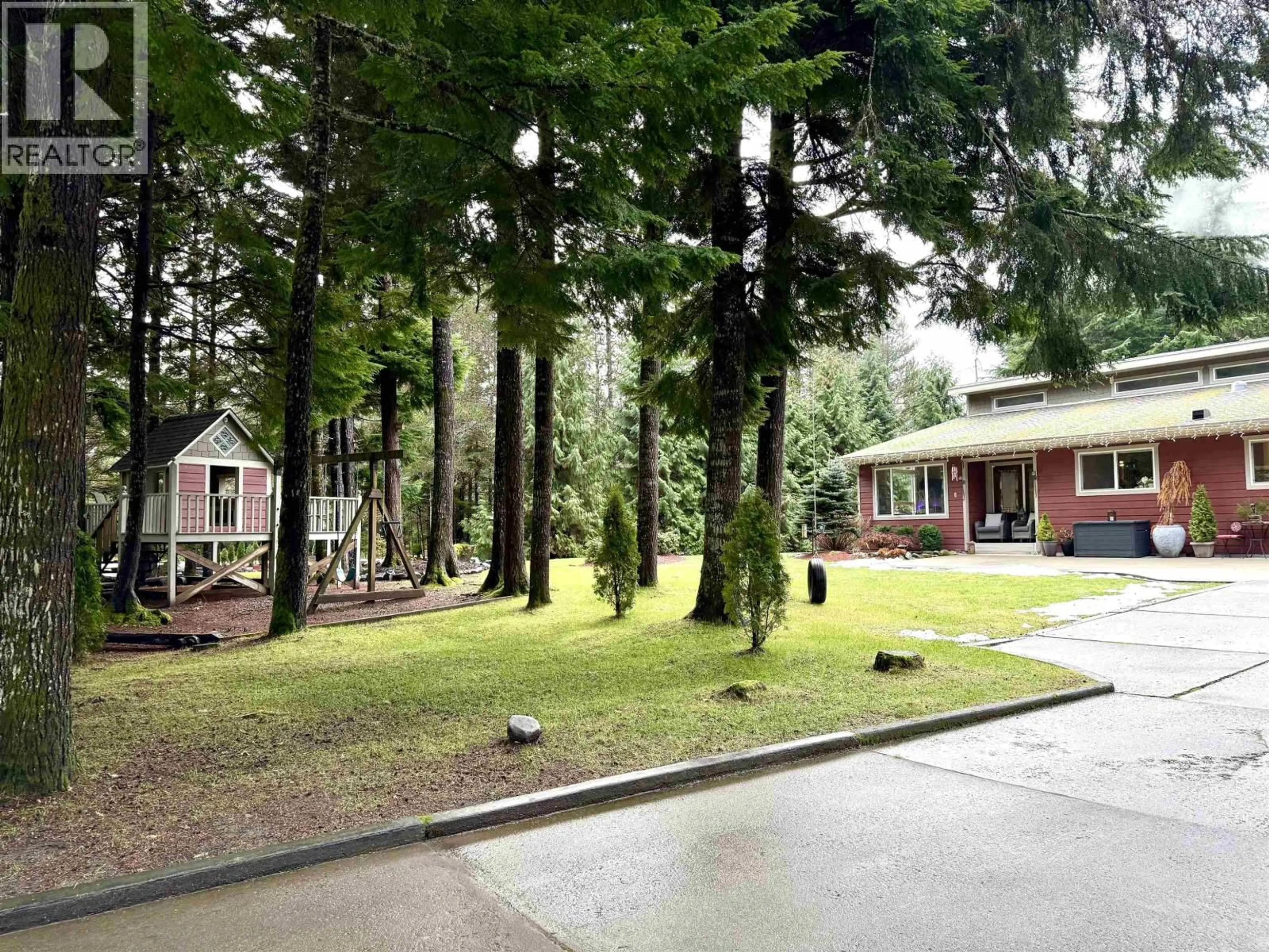 A pic from outside/outdoor area/front of a property/back of a property/a pic from drone, forest/trees view for 94 COHO AVENUE, Kitimat British Columbia V8C2K6