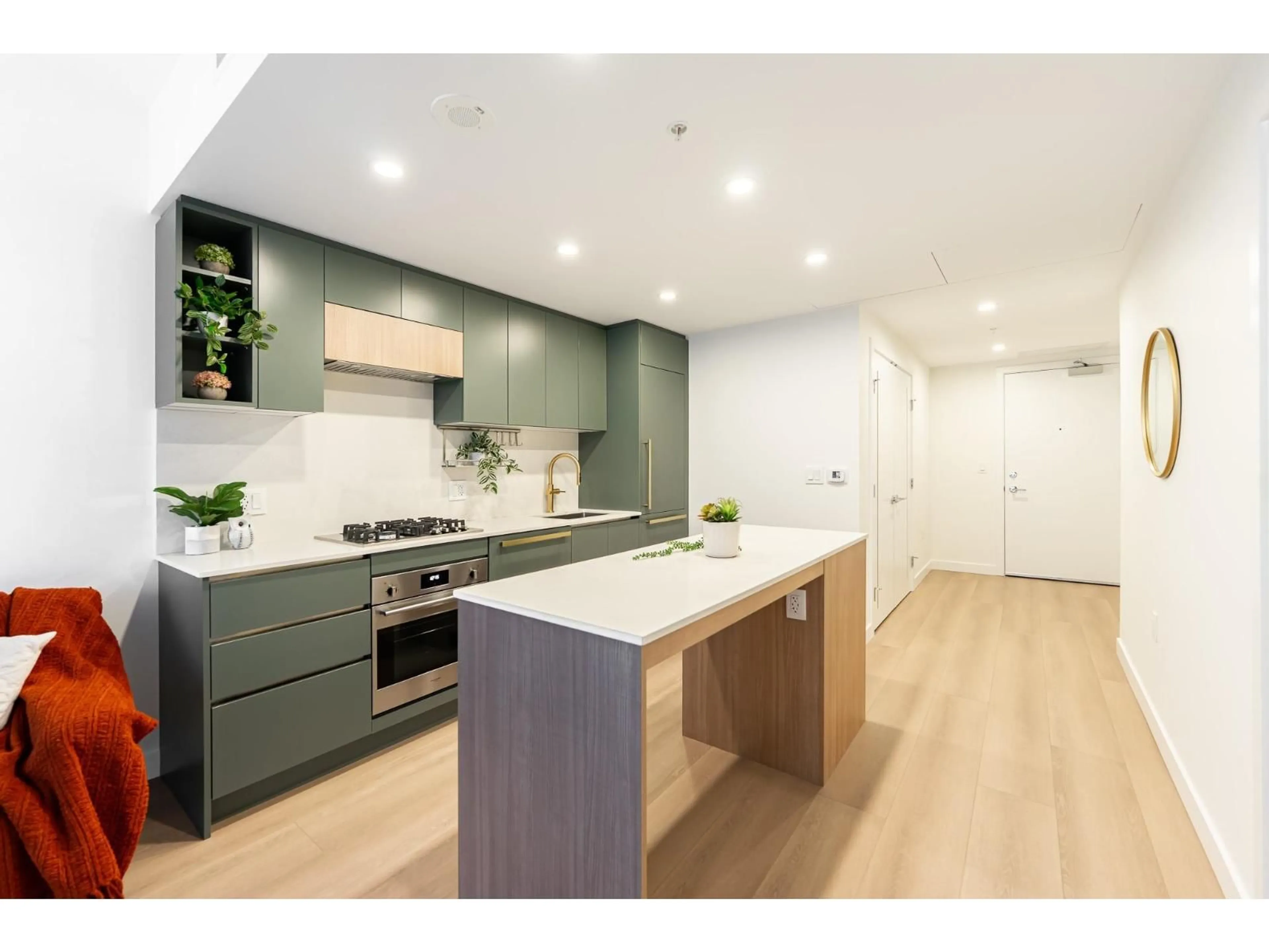 Open concept kitchen, wood/laminate floor for 1110 - 13573 98A AVENUE, Surrey British Columbia V3T0X1