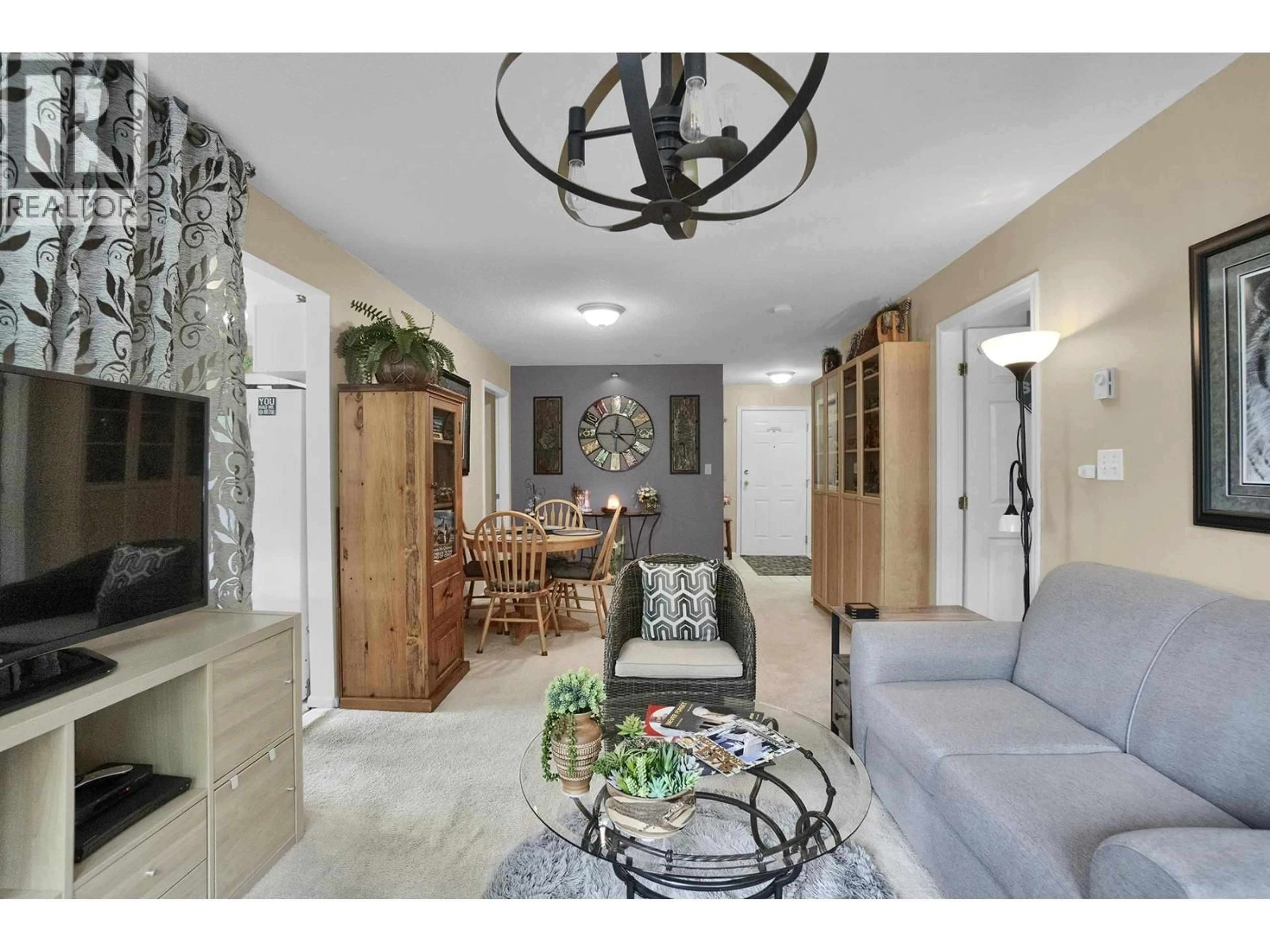 Living room with furniture, ceramic/tile floor for 313 - 3085 PRIMROSE LANE, Coquitlam British Columbia V3B7S3