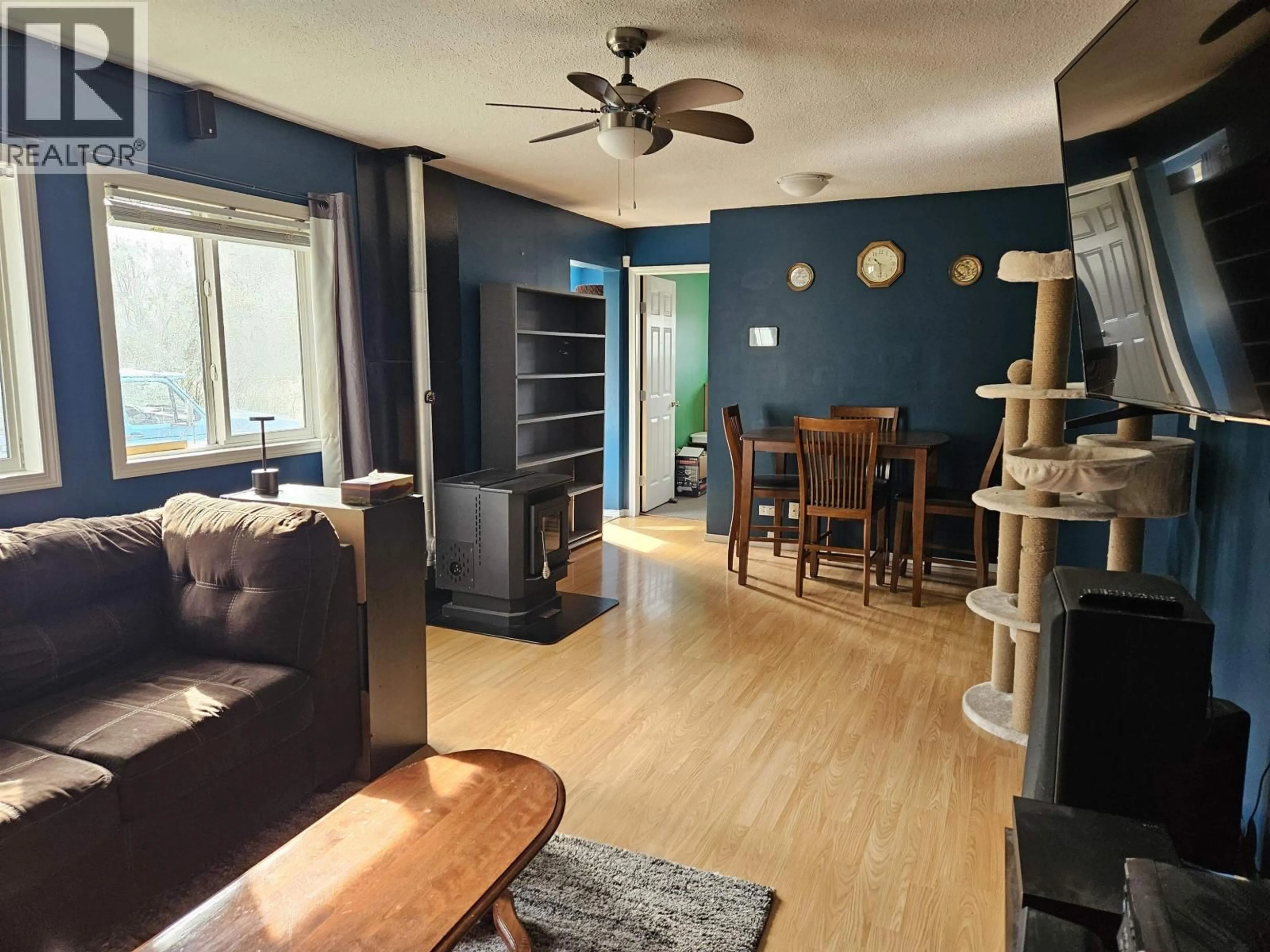Living room with furniture, wood/laminate floor for 3515 KALUM STREET, Terrace British Columbia V8G2P1
