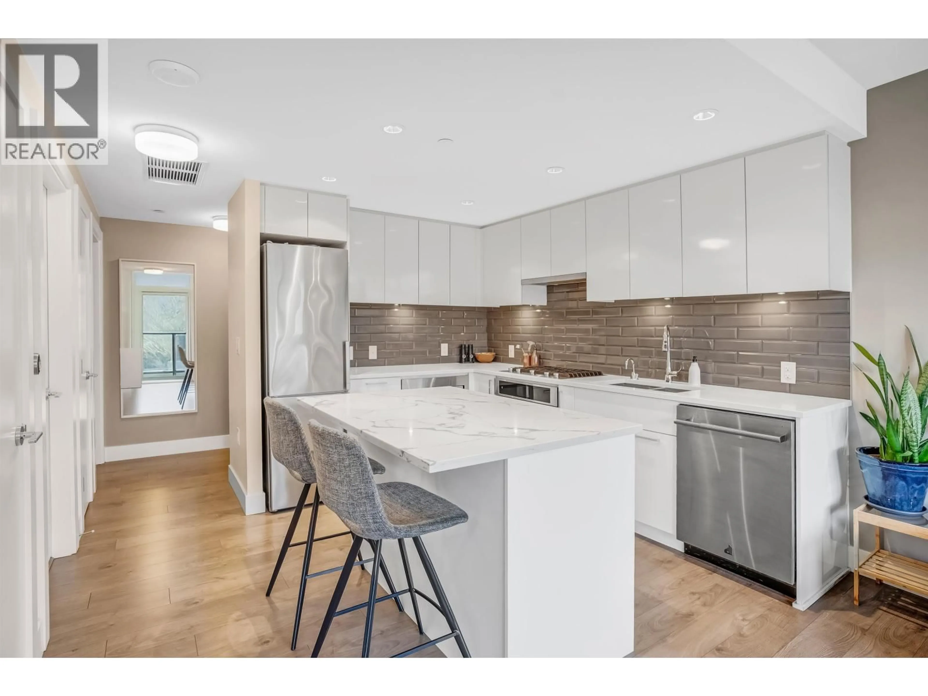 Open concept kitchen, ceramic/tile floor for 1008 - 8533 RIVER DISTRICT CROSSING, Vancouver British Columbia V5S0H2
