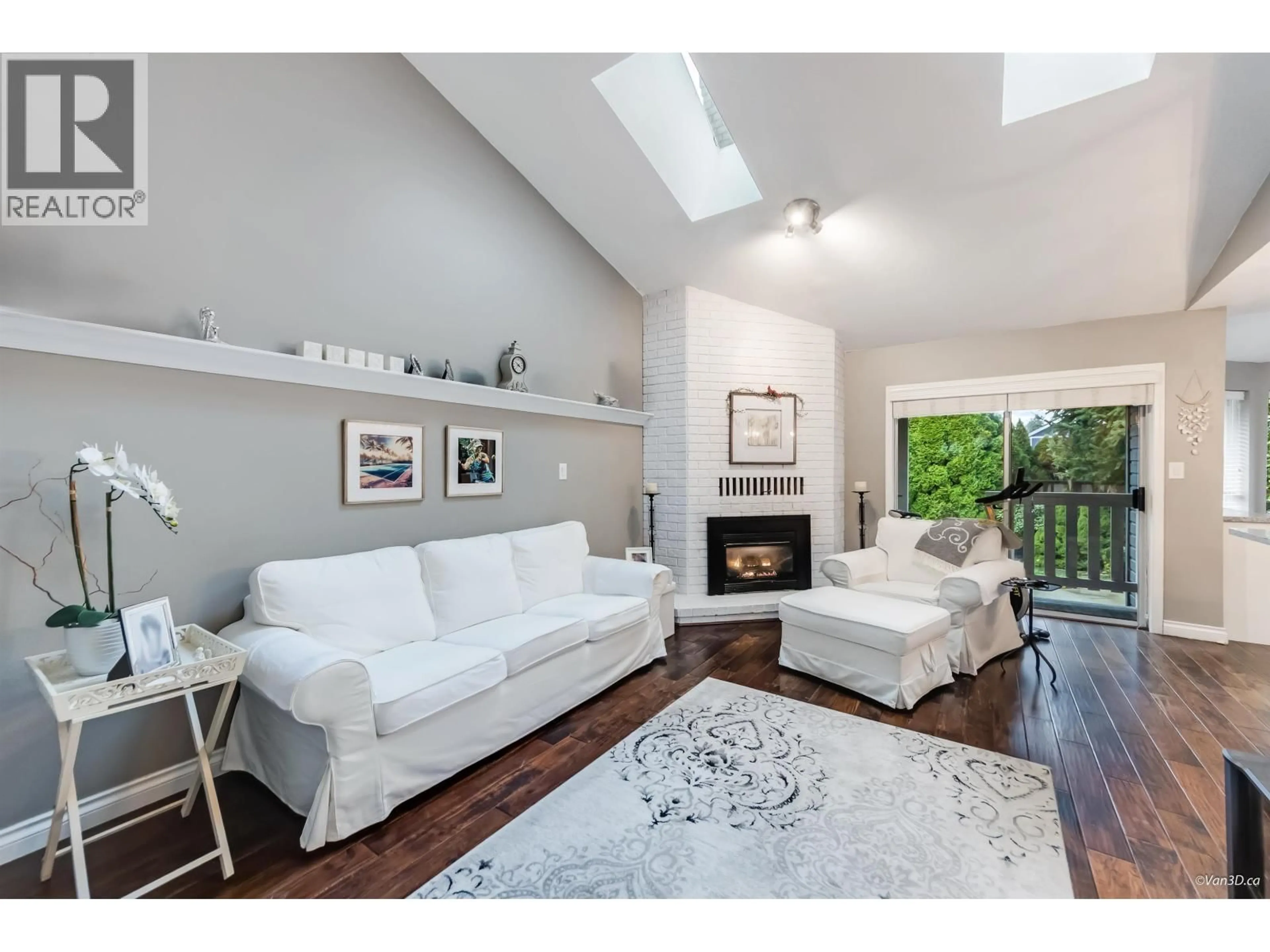 Living room with furniture, wood/laminate floor for 12409 204B STREET, Maple Ridge British Columbia V2X0A3